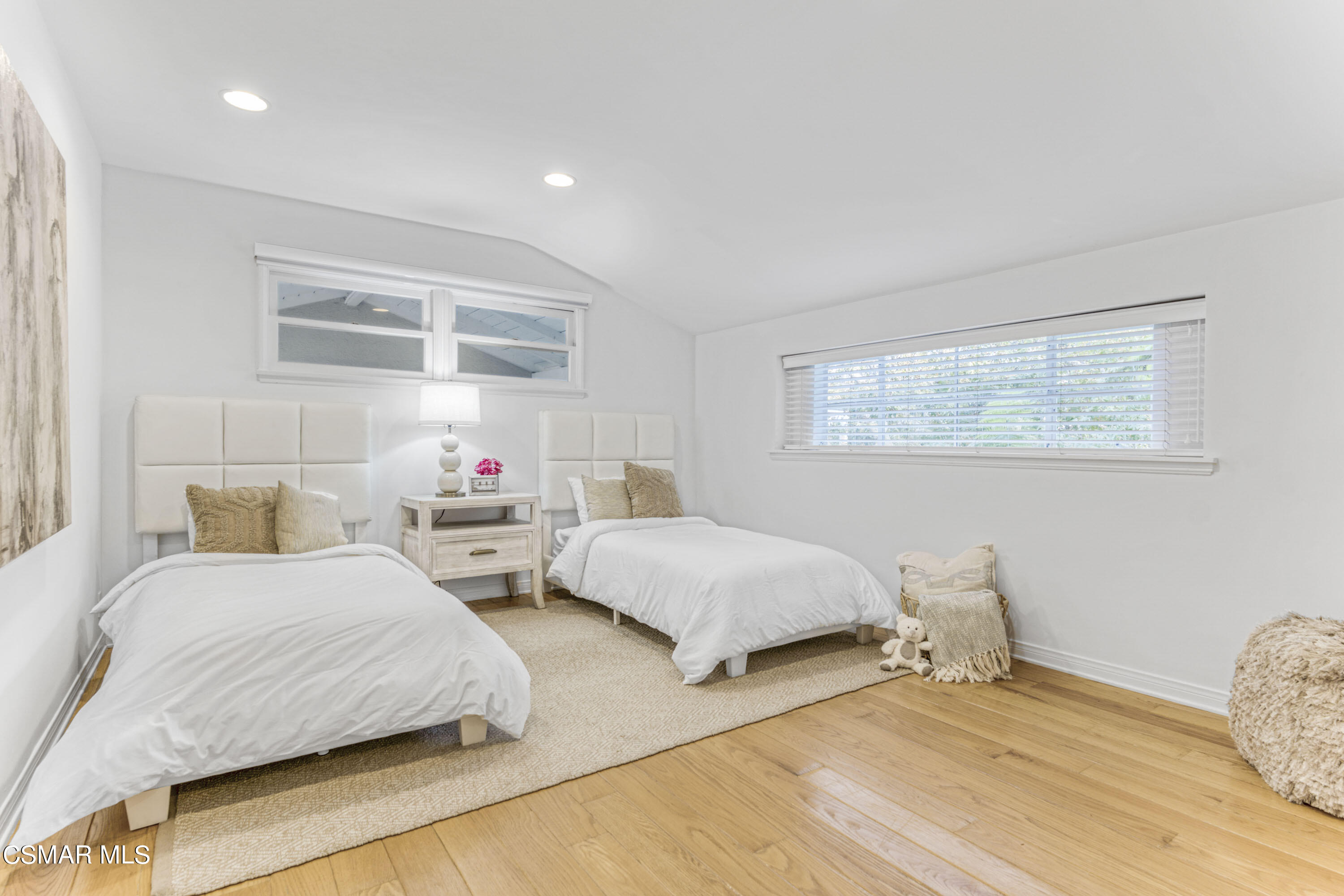 14401 Villa Woods Place Pacific Palisades, CA 90272 - Photo 17 of 46 a bedroom with two beds and a window