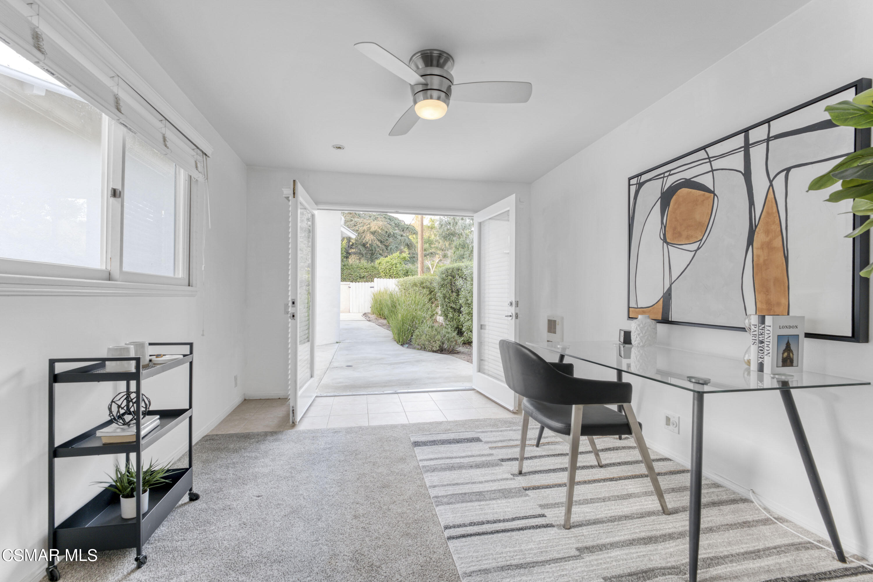 14401 Villa Woods Place Pacific Palisades, CA 90272 - Photo 24 of 46 a living room with furniture a window and wooden floor