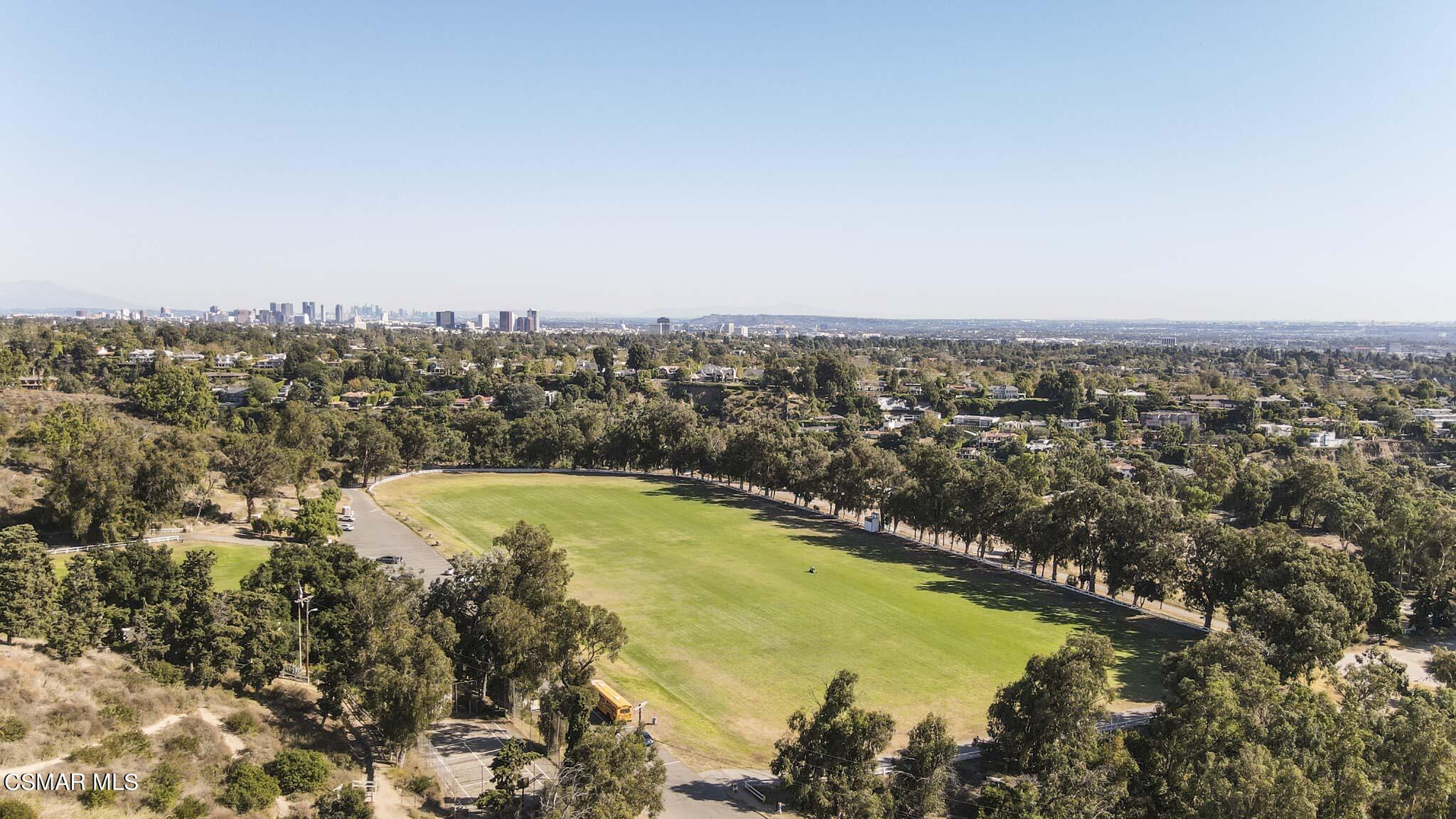 14401 Villa Woods Place Pacific Palisades, CA 90272 - Photo 38 of 46 an aerial view of residential houses with outdoor space and trees