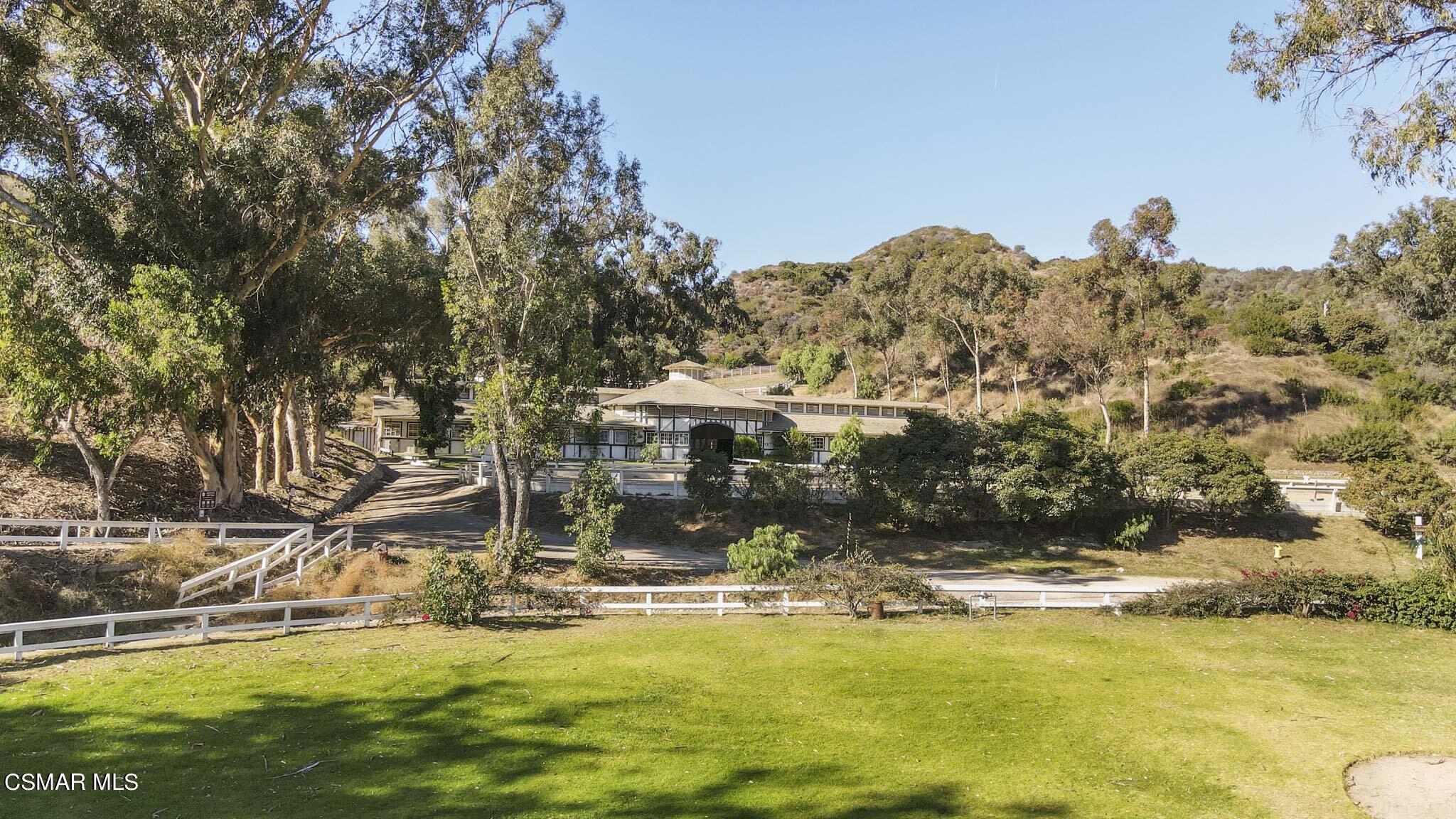 14401 Villa Woods Place Pacific Palisades, CA 90272 - Photo 41 of 46 a view of a swimming pool with an outdoor space and seating area