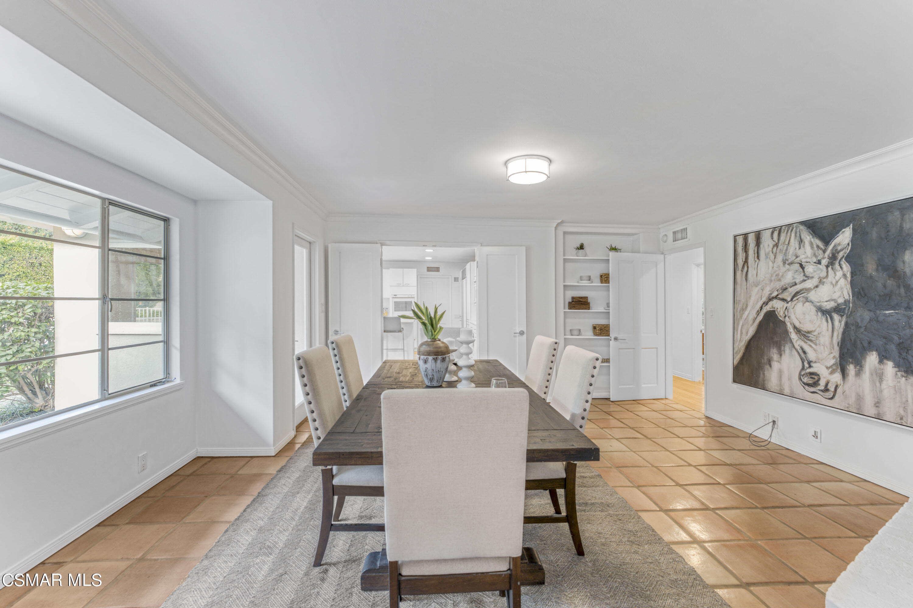 14401 Villa Woods Place Pacific Palisades, CA 90272 - Photo 6 of 46 a view of a dining room with furniture window and wooden floor
