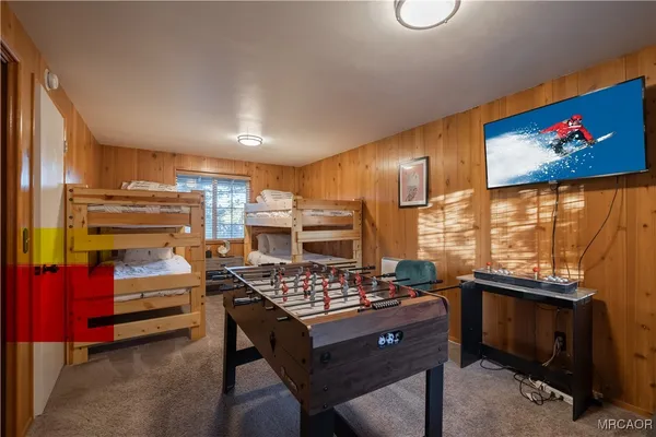 a kitchen with stainless steel appliances kitchen island granite countertop a stove and a refrigerator
