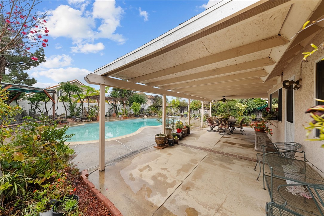 19320 Totem Court Riverside, CA 92508 - Photo 42 of 53 Expanded patio view featuring outdoor dining/lounge space with easy access to the pool.