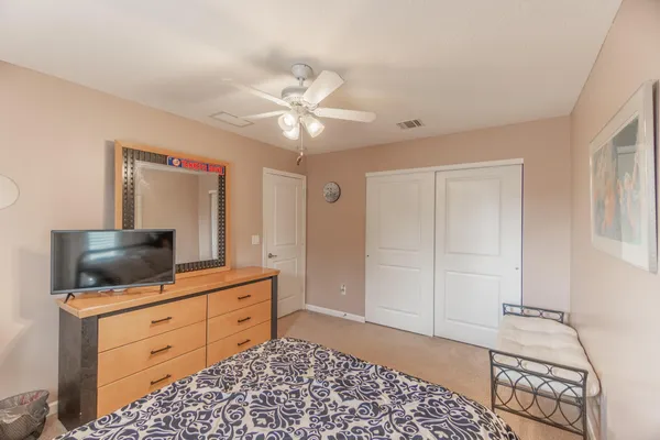 an aerial view of residential building and parking space