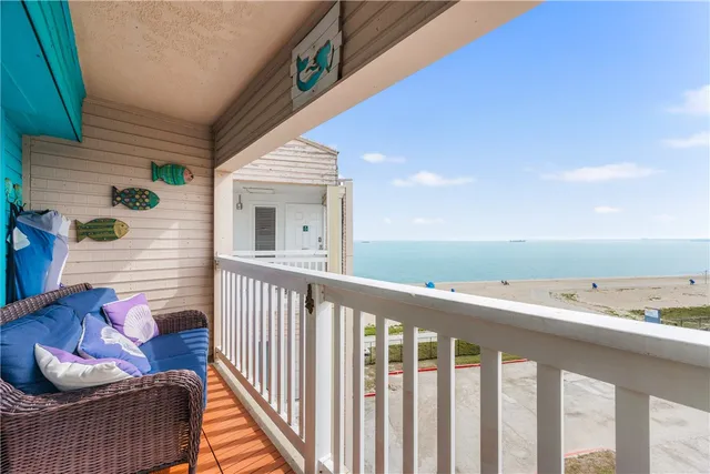 a view of balcony with furniture