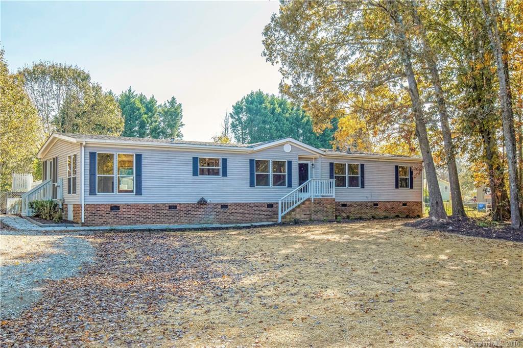 1815 Crowder Road Monroe, NC 28112 - Photo 22 of 24 a view of a yard with a house and a large tree