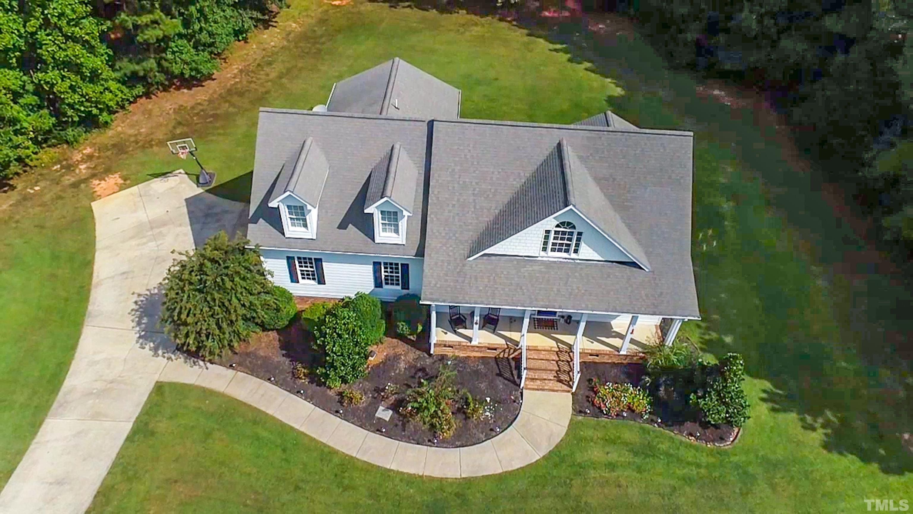 226 Fletcher Ridge Road Timberlake, NC 27583 - Photo 19 of 54 an aerial view of a house
