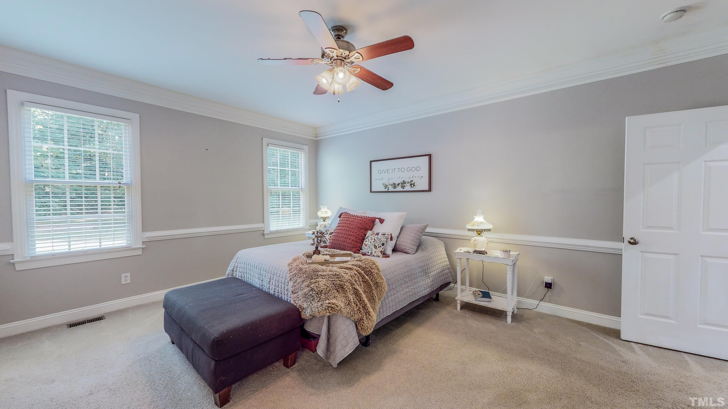 226 Fletcher Ridge Road Timberlake, NC 27583 - Photo 23 of 54 a bedroom with a bed and a window