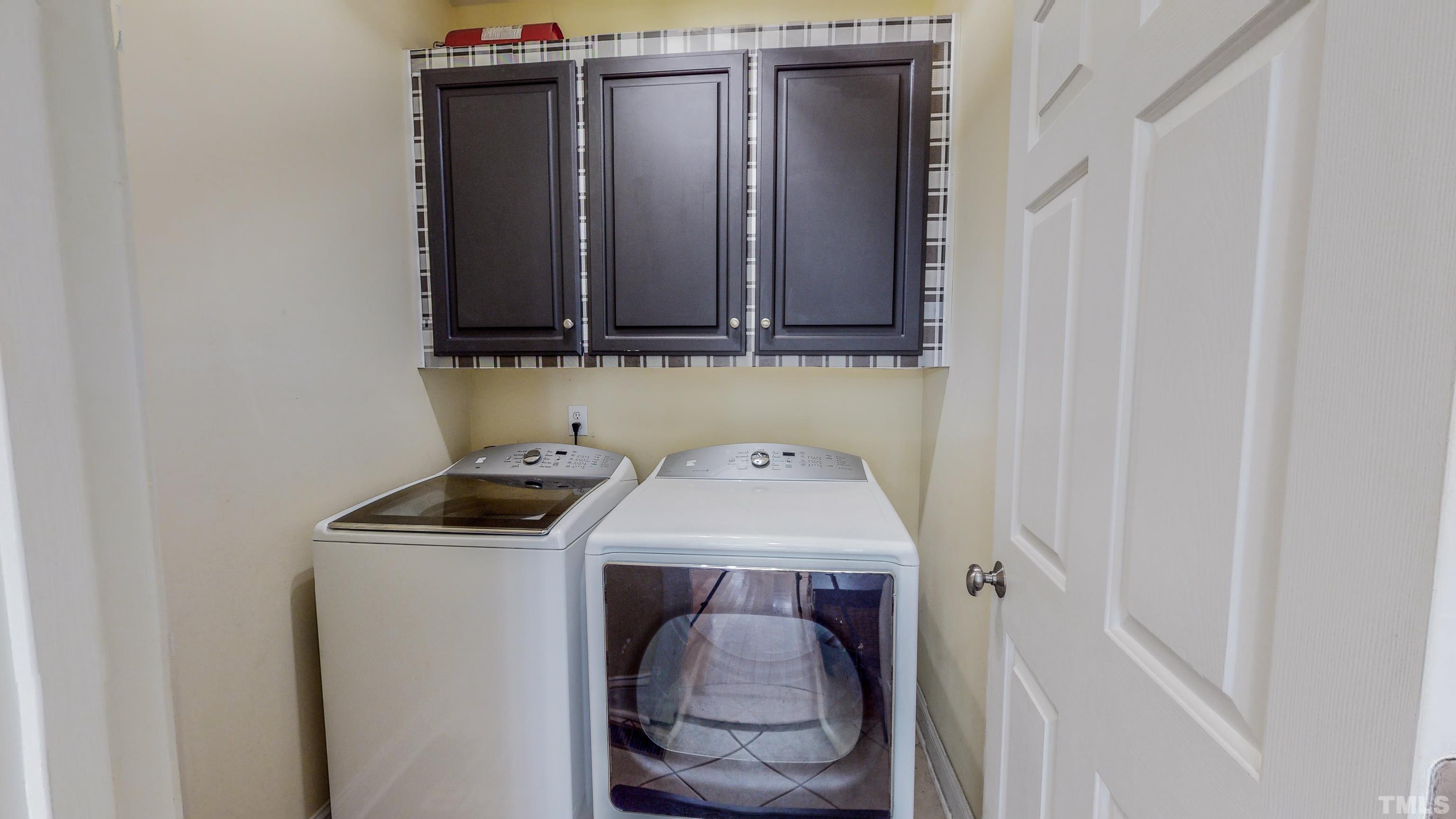 226 Fletcher Ridge Road Timberlake, NC 27583 - Photo 42 of 54 a utility room with dryer and washer