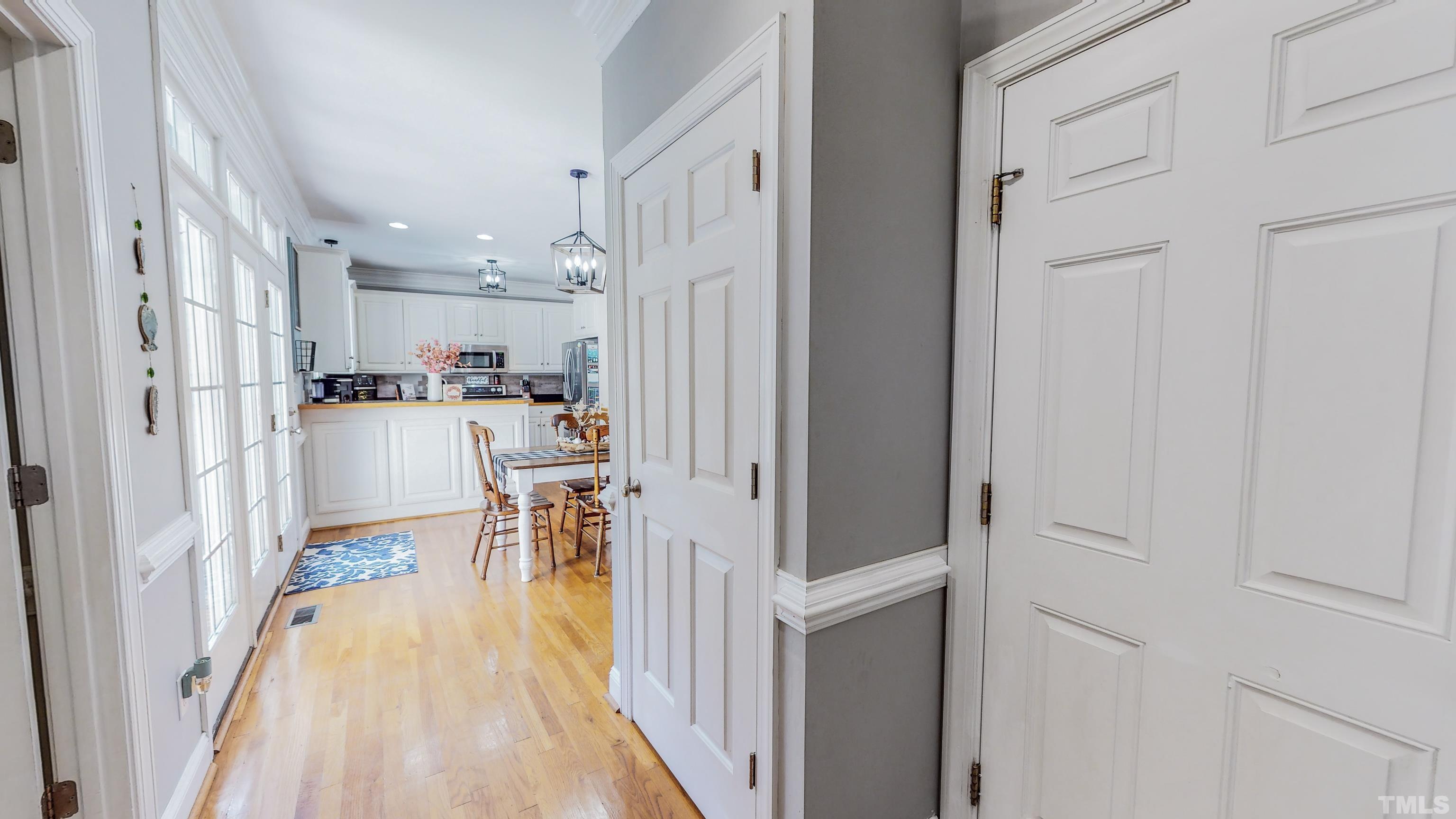 226 Fletcher Ridge Road Timberlake, NC 27583 - Photo 47 of 54 a view of a kitchen with dining table and chairs