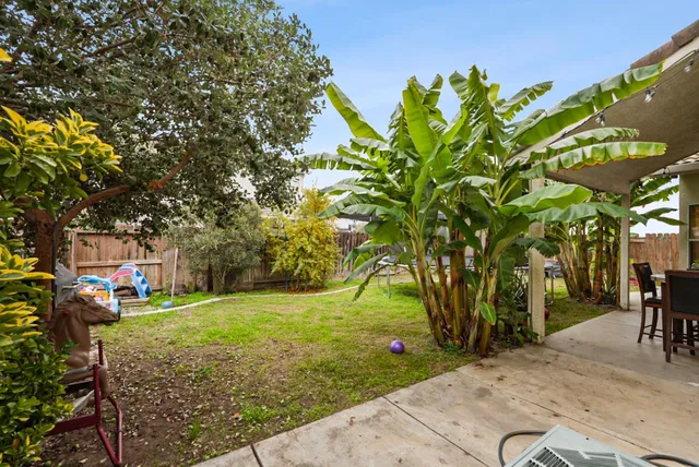 a view of a backyard with a garden