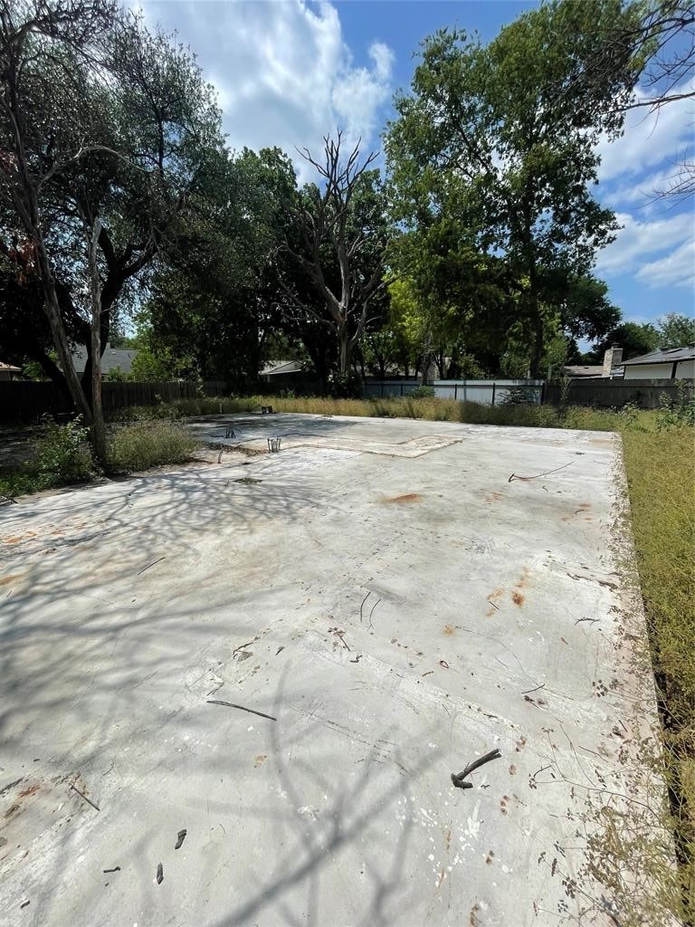 4502 Eric Circle Austin, TX 78744 - Photo 14 of 17 a view of swimming pool with a yard