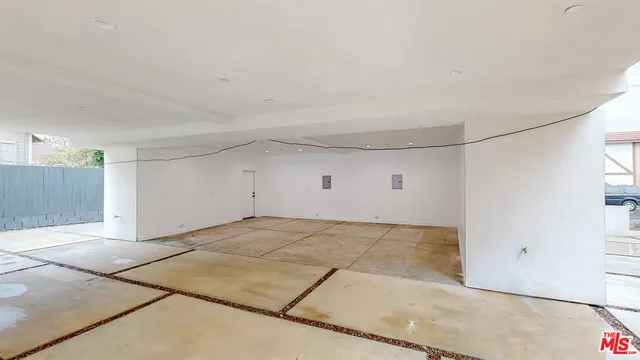 a close view of a bathroom with a washer and dryer