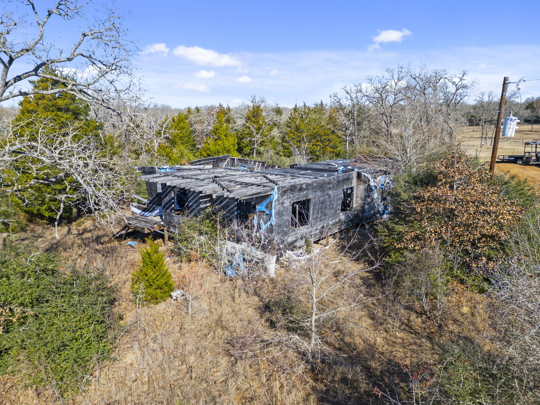 0 Starlight Path Caldwell, TX 77836 - Photo 6 of 16 a view of a house with a yard and mountains