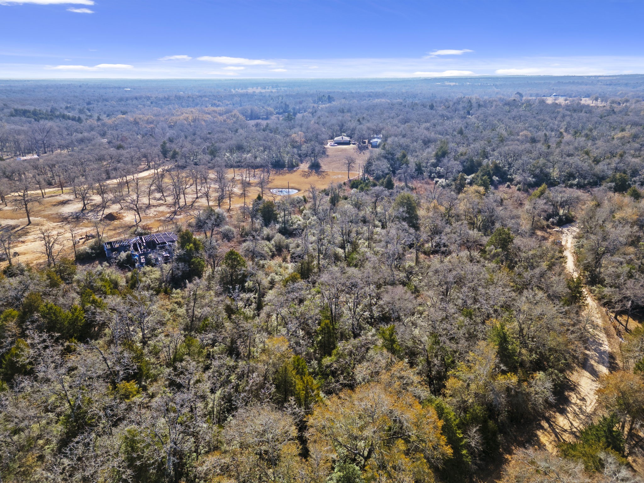 0 Starlight Path Caldwell, TX 77836 - Photo 9 of 16 an aerial view of a house with a yard