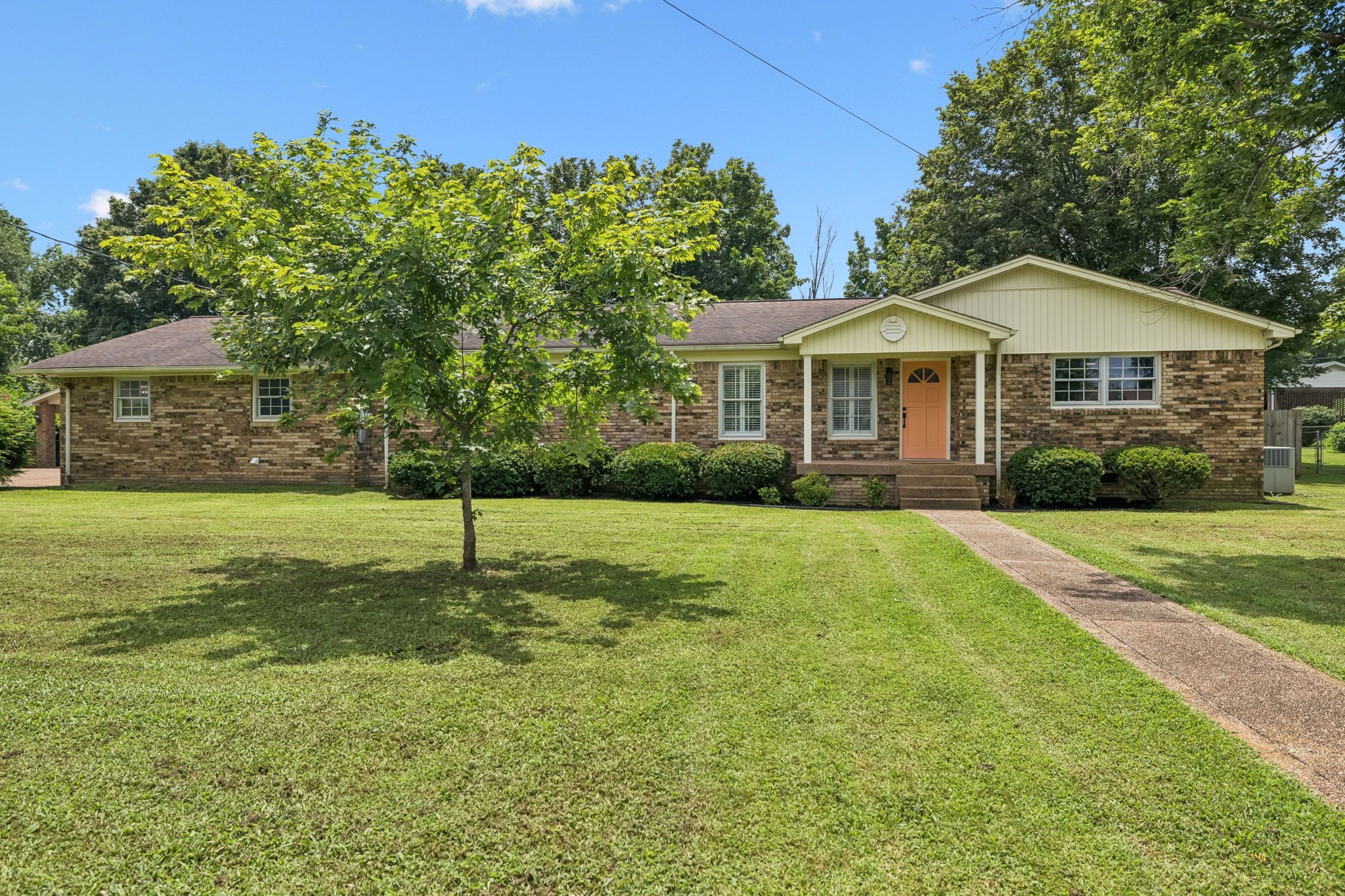 1005 Wilson Lane Pulaski, TN 38478 - Photo 11 of 71 a front view of a house with a garden