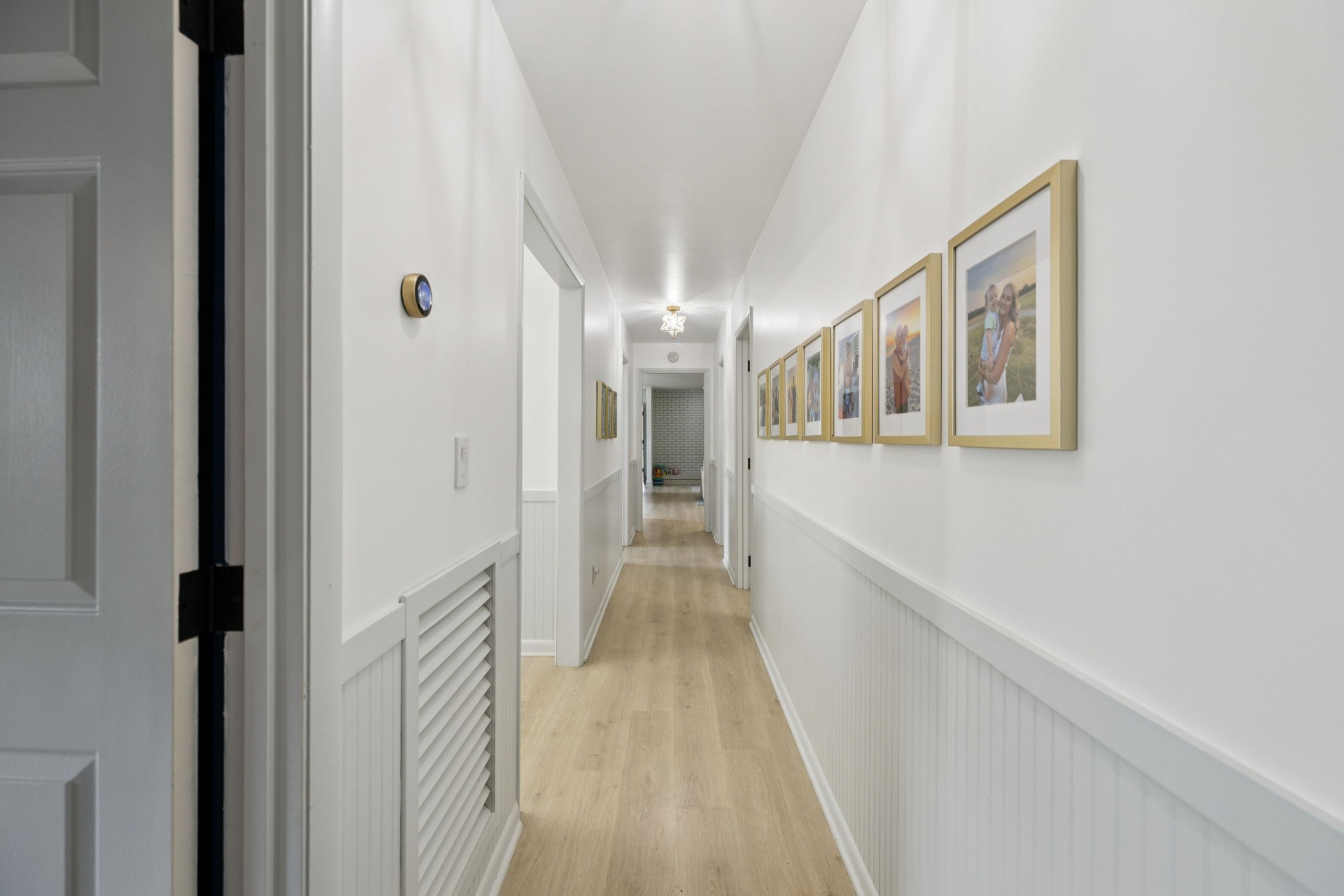 1005 Wilson Lane Pulaski, TN 38478 - Photo 17 of 71 a view of a hallway with wooden floor and staircase
