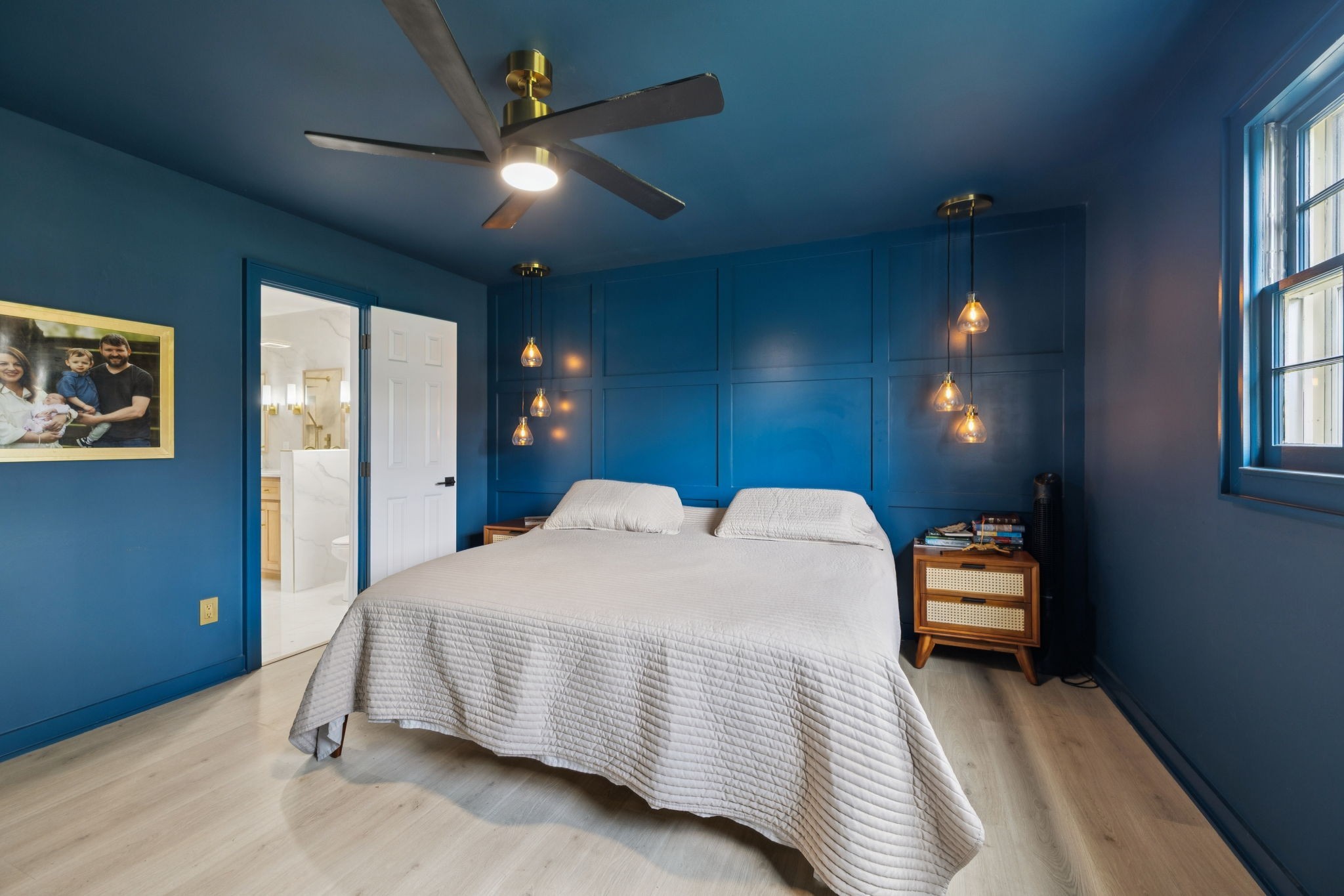 1005 Wilson Lane Pulaski, TN 38478 - Photo 29 of 71 a bedroom with a bed and a chandelier