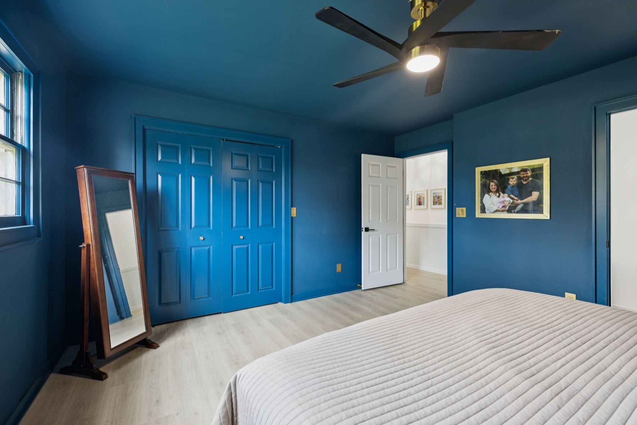 1005 Wilson Lane Pulaski, TN 38478 - Photo 30 of 71 a bedroom with a bed and a flat screen tv