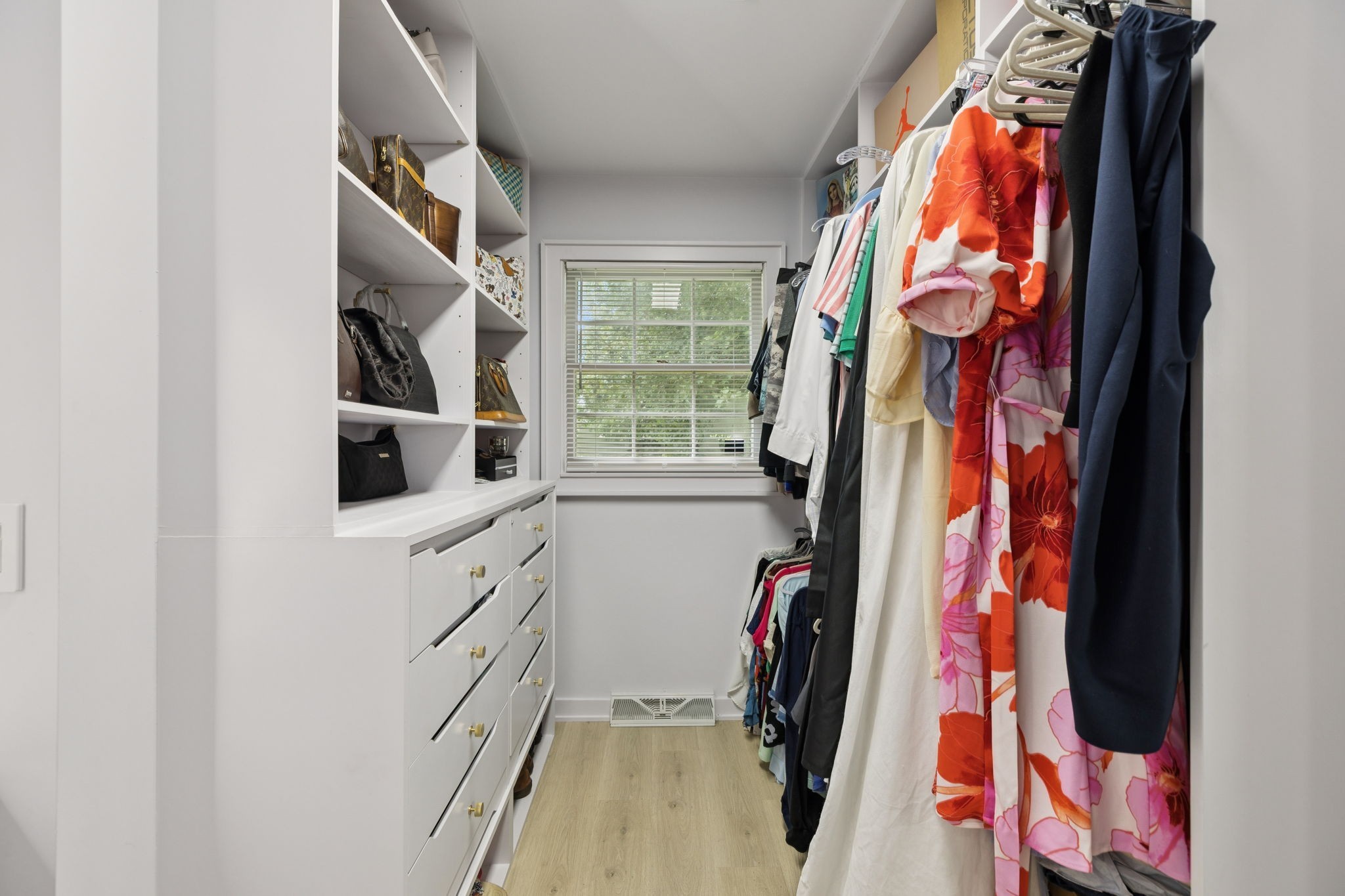 1005 Wilson Lane Pulaski, TN 38478 - Photo 35 of 71 a view of walk in closet with clothes and shoes