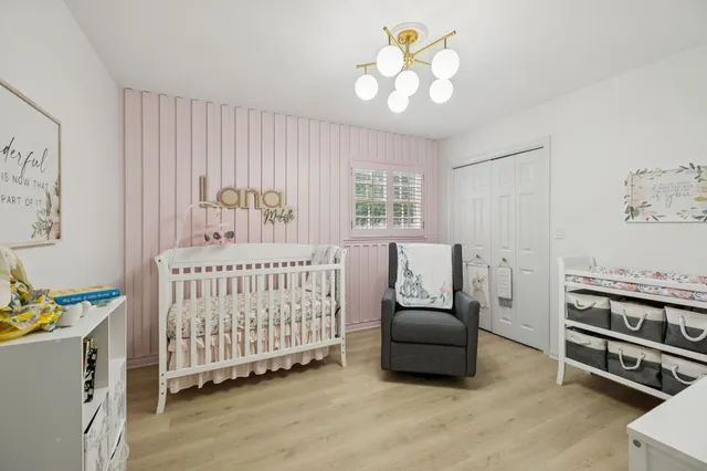 an aerial view of a house with a garden