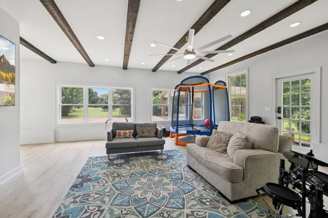 an aerial view of a house with a yard