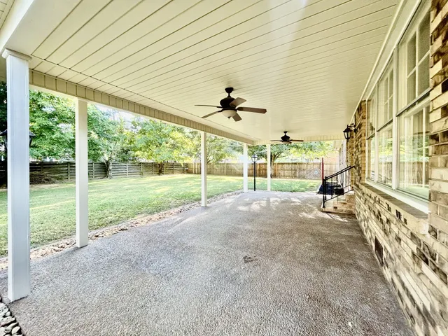 an aerial view of residential house with outdoor space