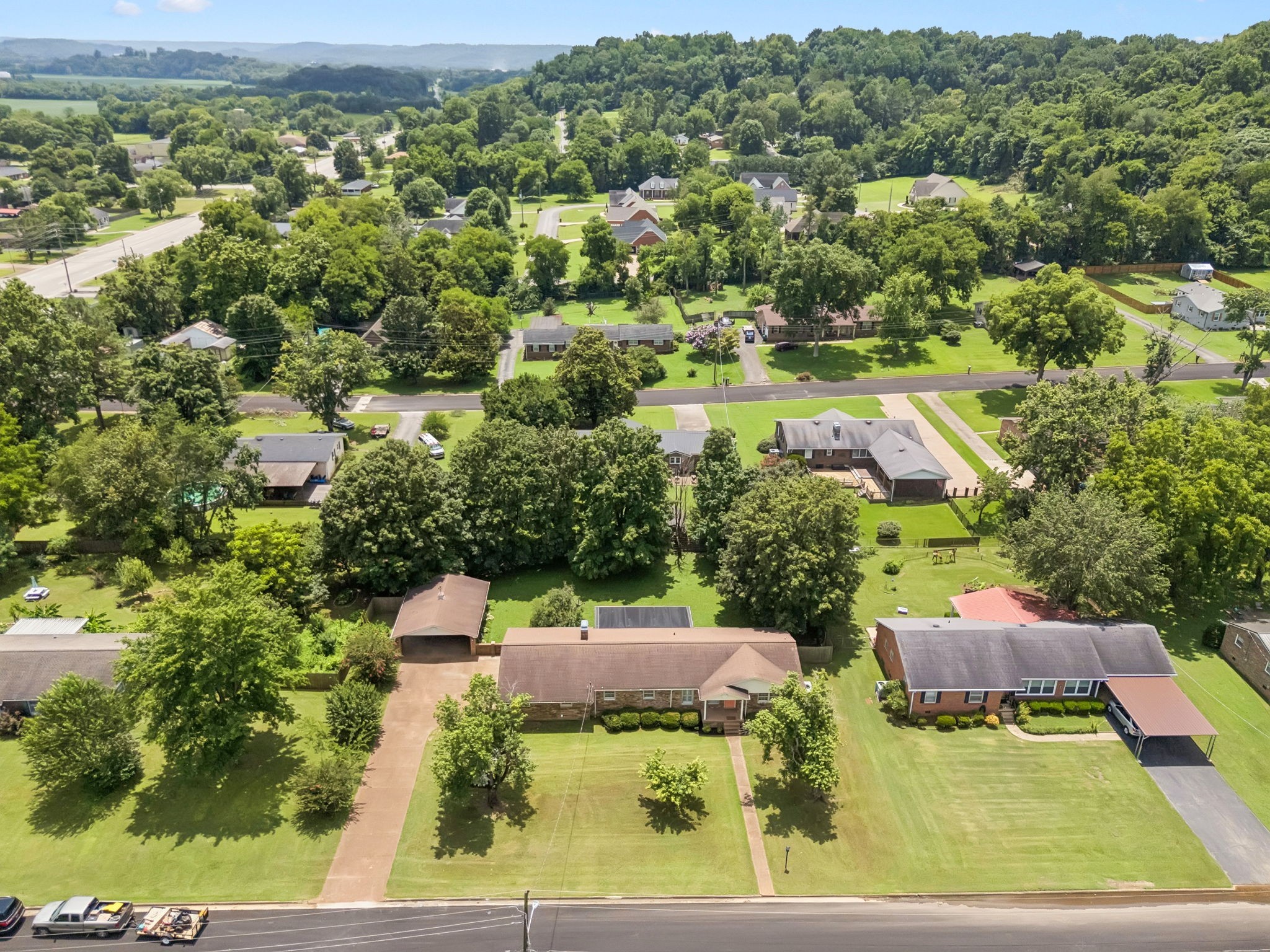 1005 Wilson Lane Pulaski, TN 38478 - Photo 52 of 71 an aerial view of house with yard swimming pool and outdoor seating
