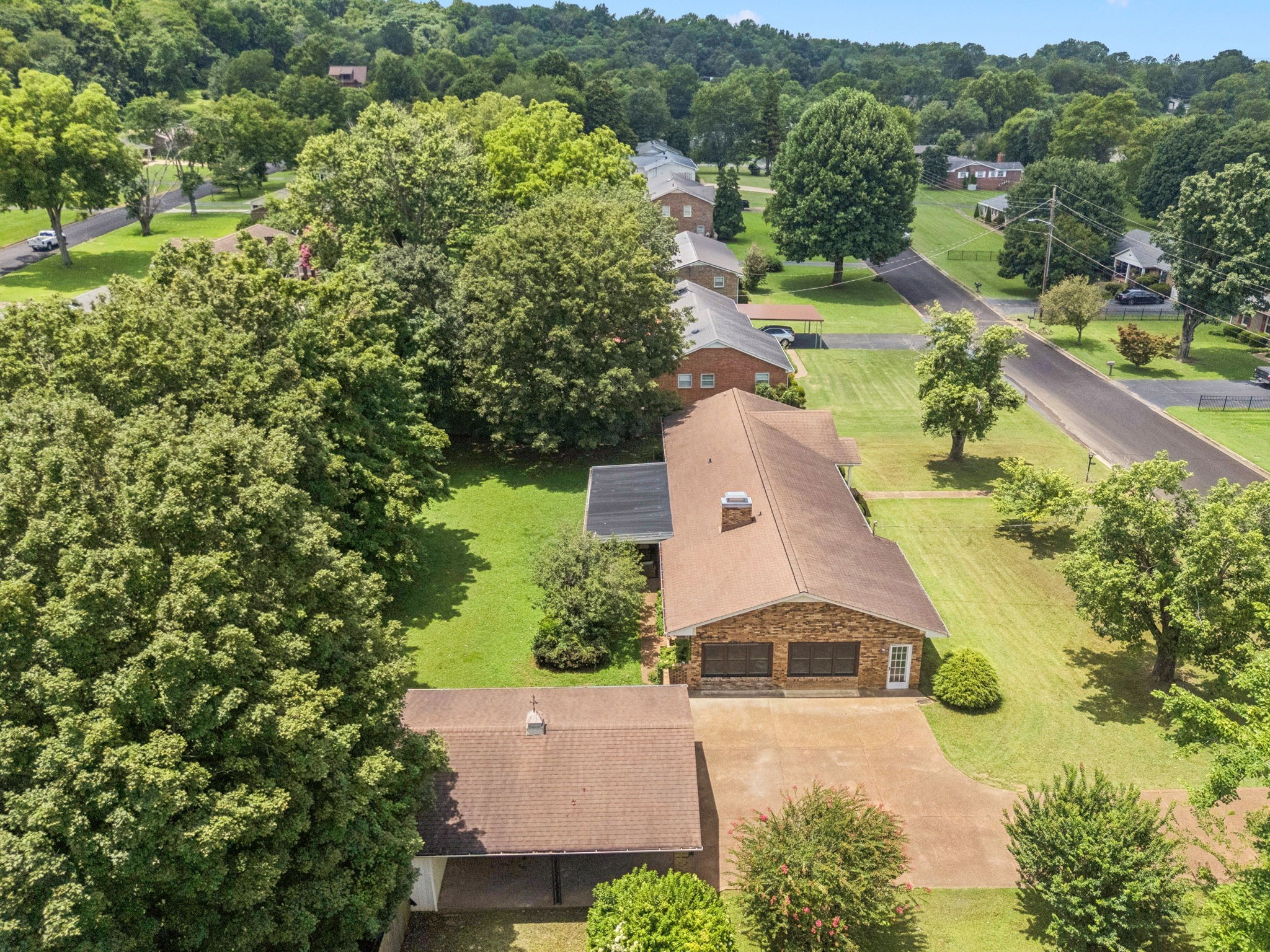 1005 Wilson Lane Pulaski, TN 38478 - Photo 58 of 71 an aerial view of a house with a garden and swimming pool