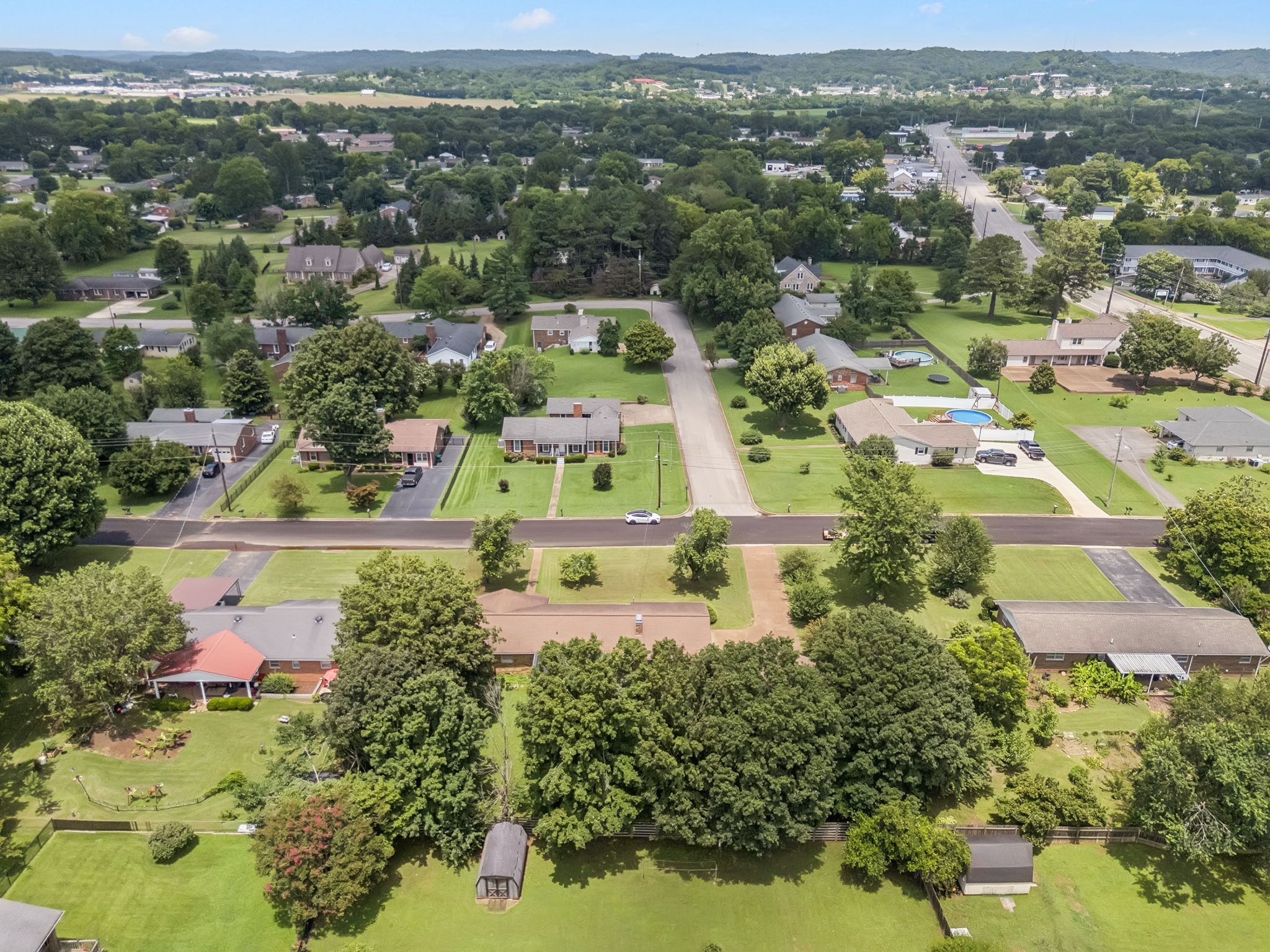 1005 Wilson Lane Pulaski, TN 38478 - Photo 61 of 71 an aerial view of a houses with a lake
