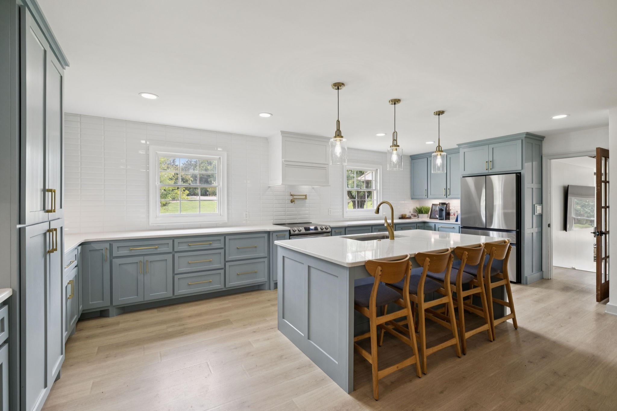 1005 Wilson Lane Pulaski, TN 38478 - Photo 7 of 71 a kitchen with a stove a refrigerator and a sink