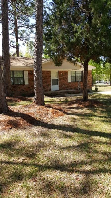 3310 Auburn Road Crestview, FL 32539 - Photo 43 of 44 a view of a house with a yard