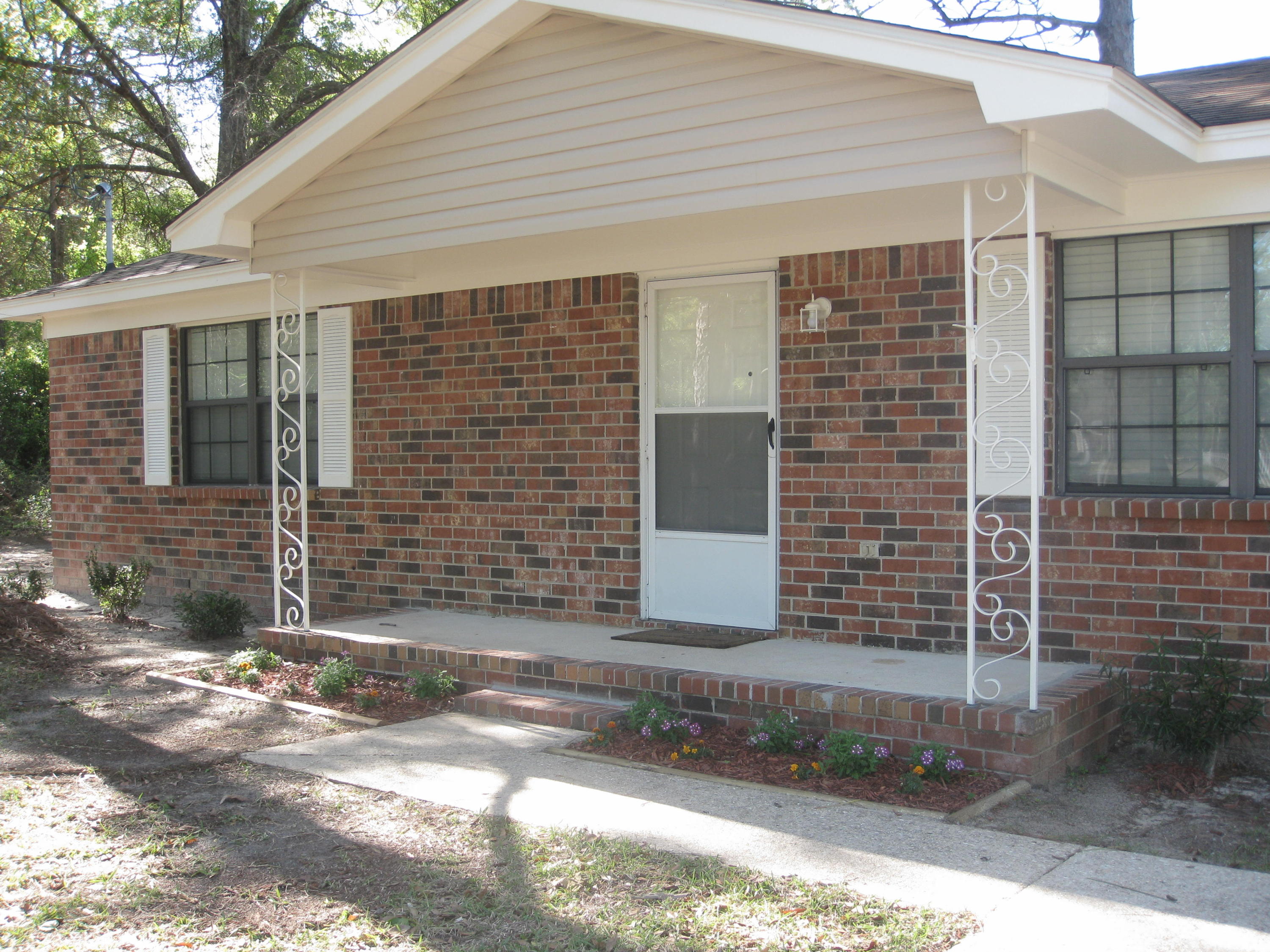 3310 Auburn Road Crestview, FL 32539 - Photo 44 of 44 a front view of a house with garage