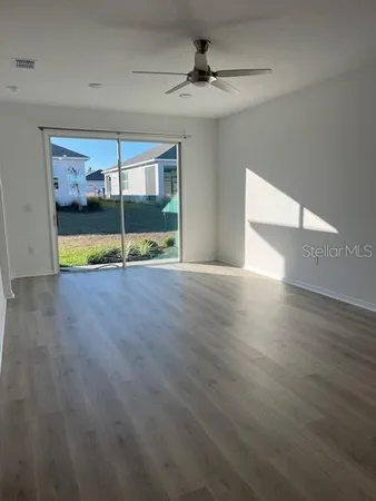 a view of an empty room with window