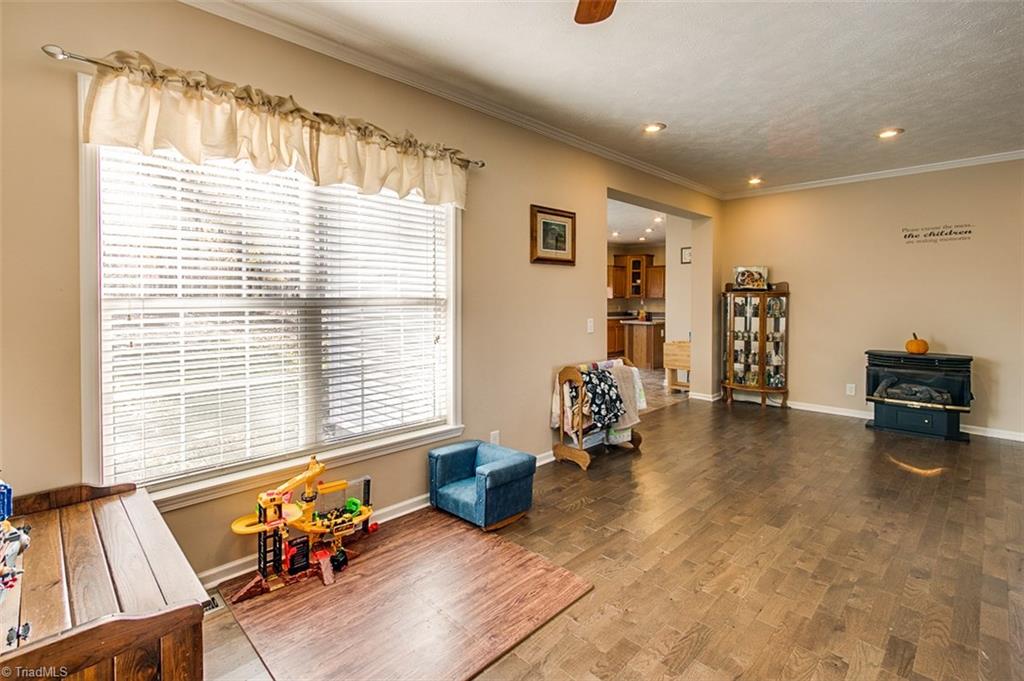 6581 Mt Lebanon Road Troy, NC 27371 - Photo 14 of 30 Dining Area has free standing fireplace.