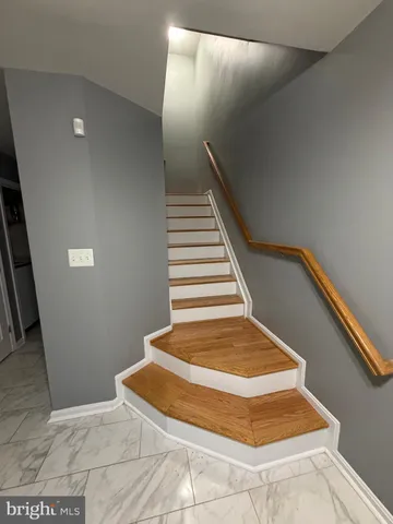 a kitchen with stainless steel appliances granite countertop a refrigerator sink and cabinets