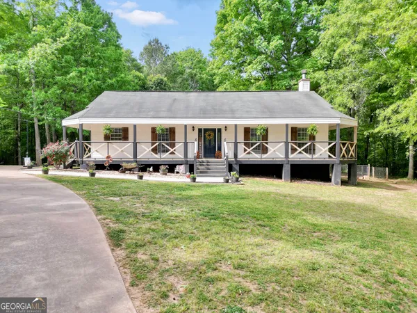 front view of a house with a yard
