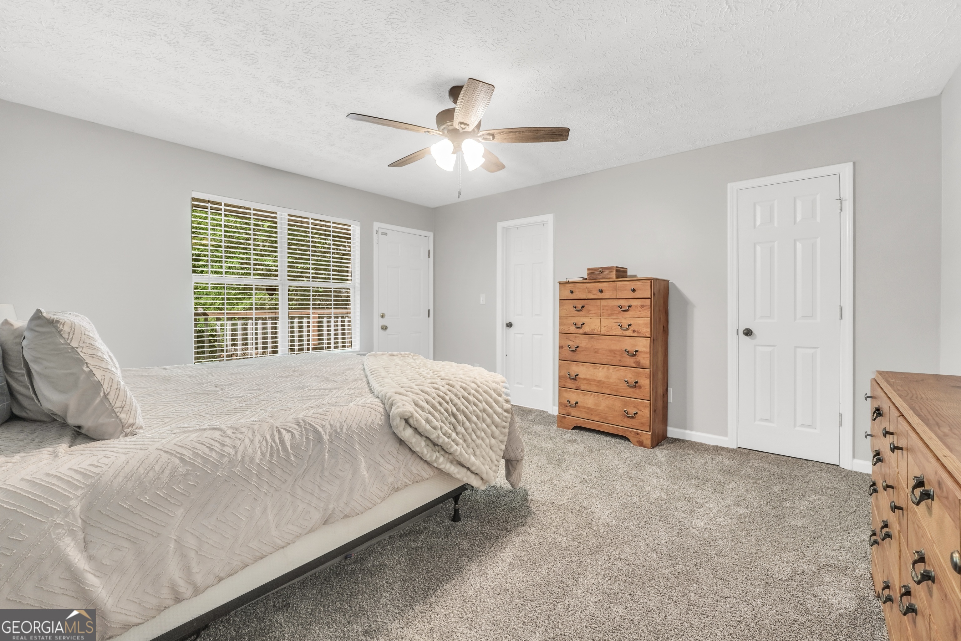 533 Chuli Road Griffin, GA 30223 - Photo 11 of 53 a bedroom with a bed and a cabinets