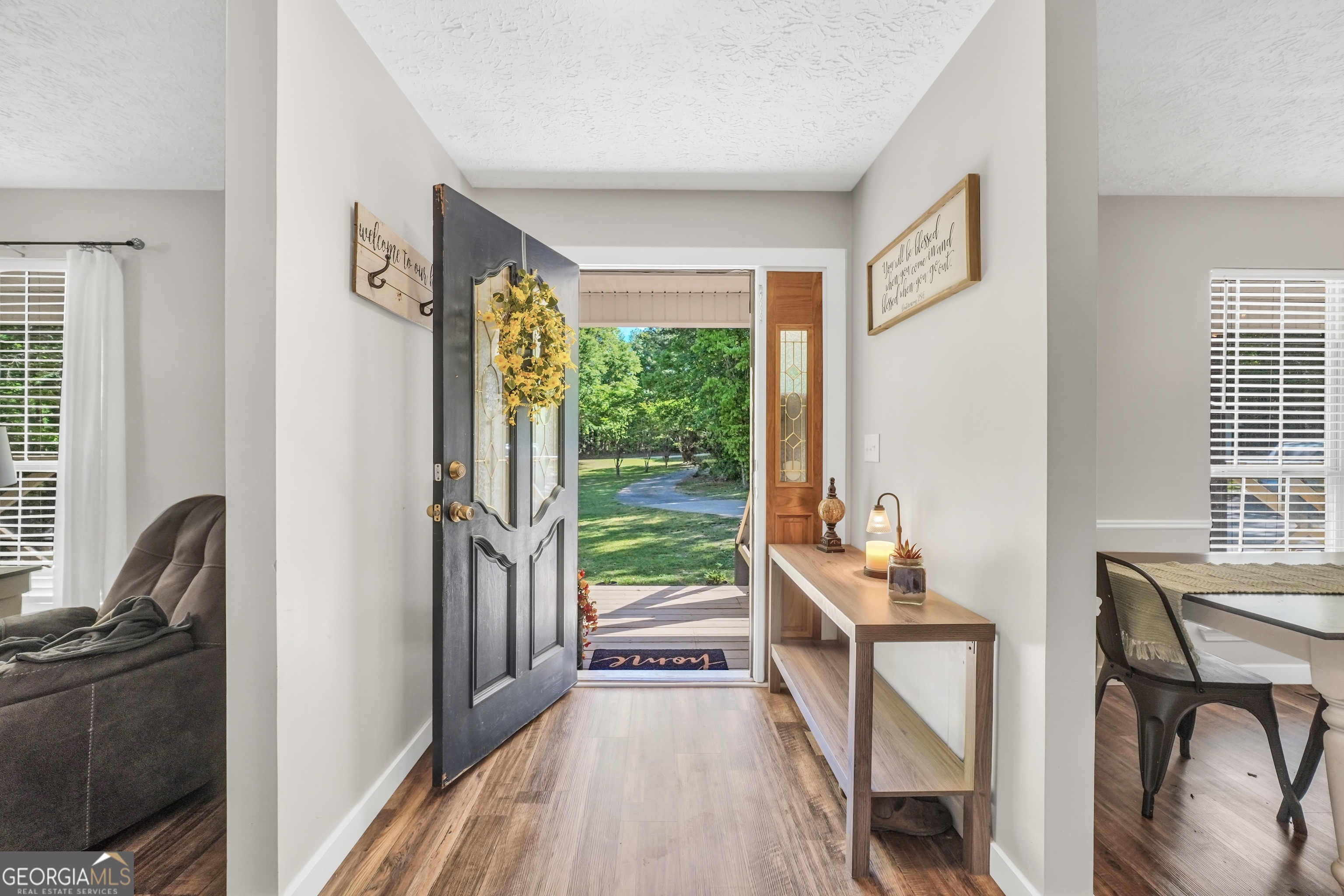 533 Chuli Road Griffin, GA 30223 - Photo 19 of 53 a view of a hallway with furniture and front door