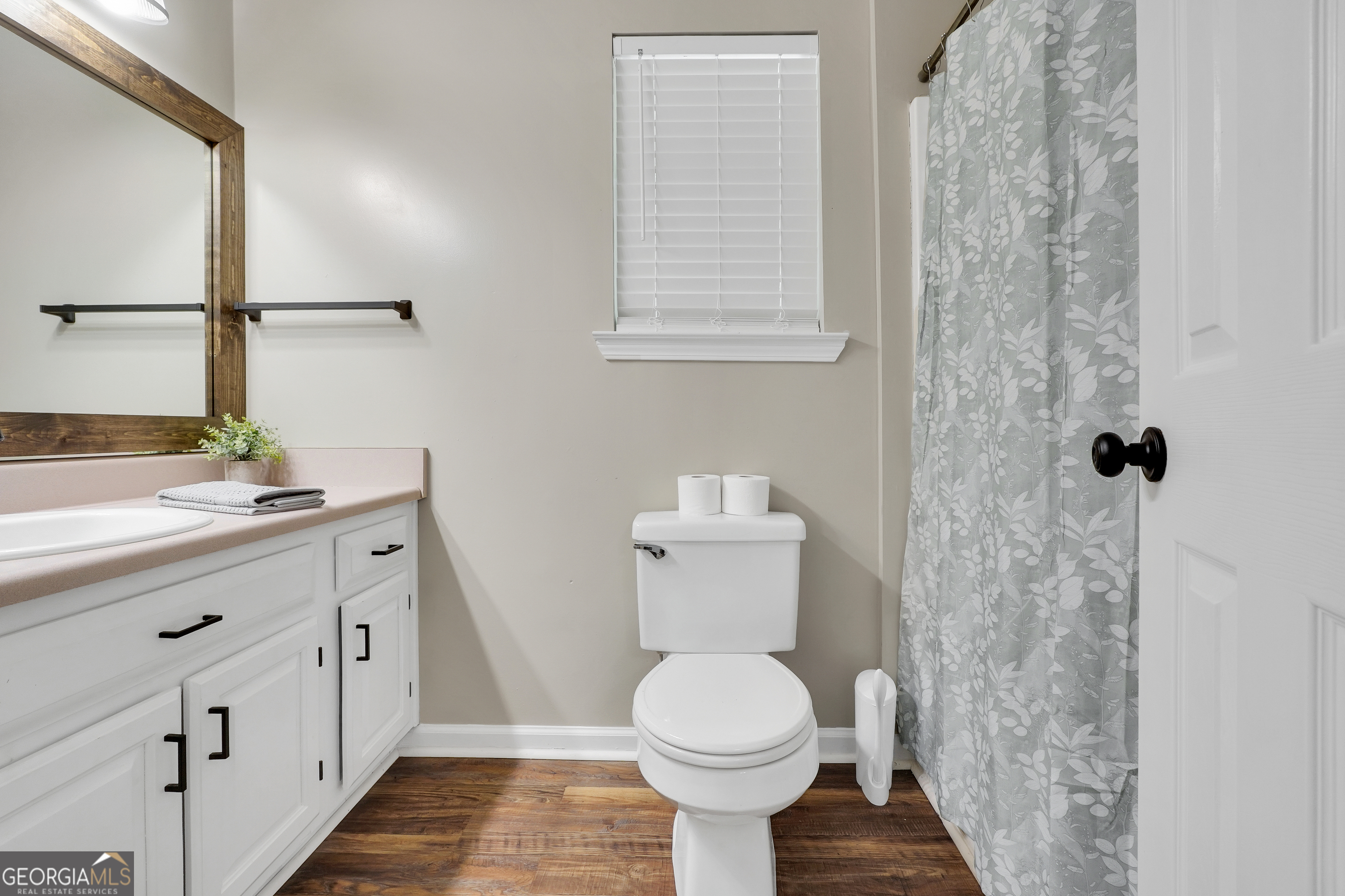 533 Chuli Road Griffin, GA 30223 - Photo 38 of 53 a bathroom with a sink toilet and shower