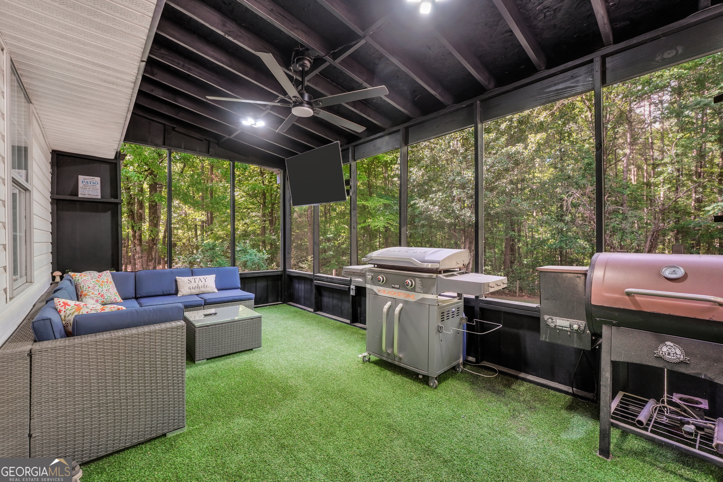 533 Chuli Road Griffin, GA 30223 - Photo 42 of 53 a view of a livingroom with furniture and a backyard