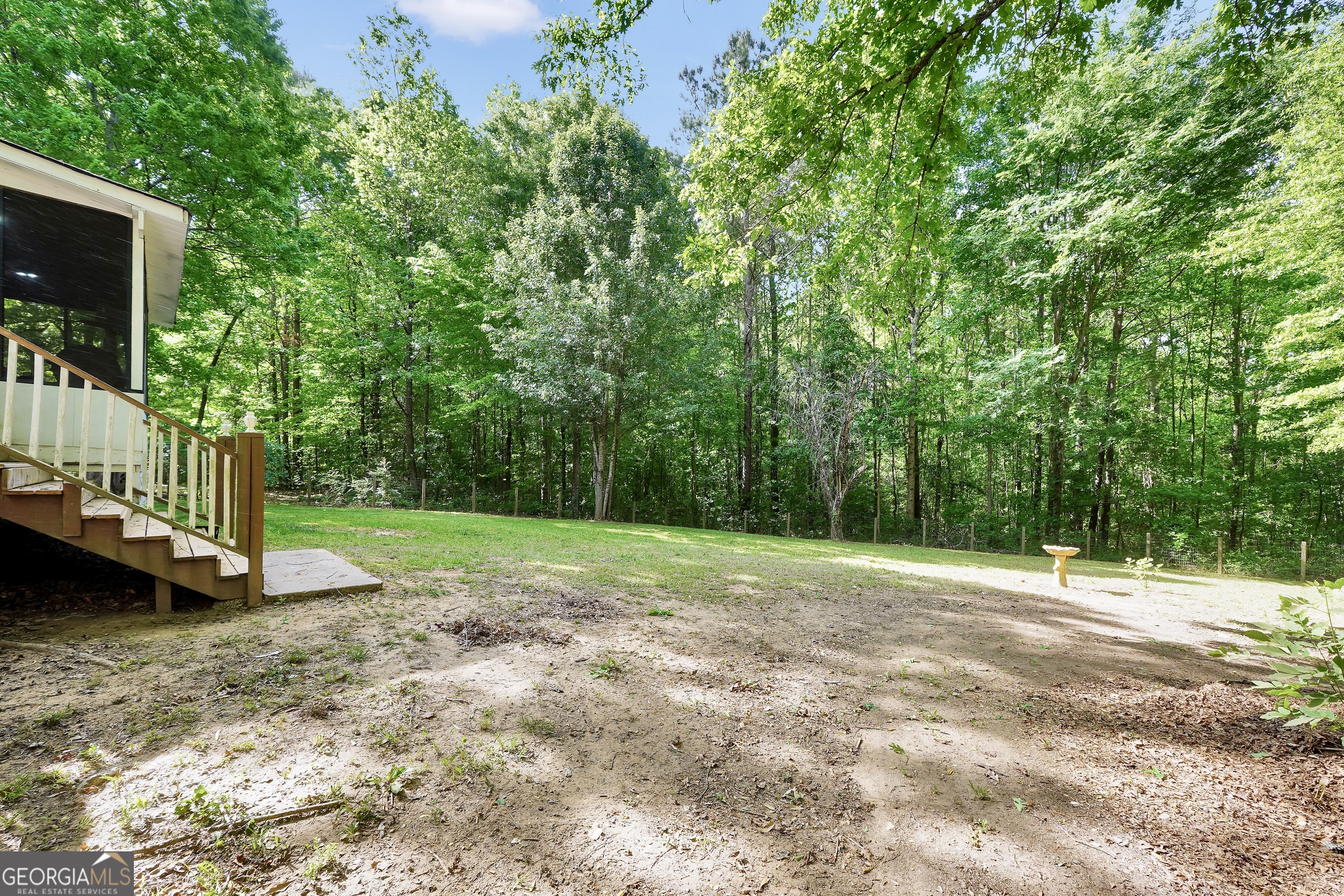 533 Chuli Road Griffin, GA 30223 - Photo 44 of 53 a view of a backyard with a car park