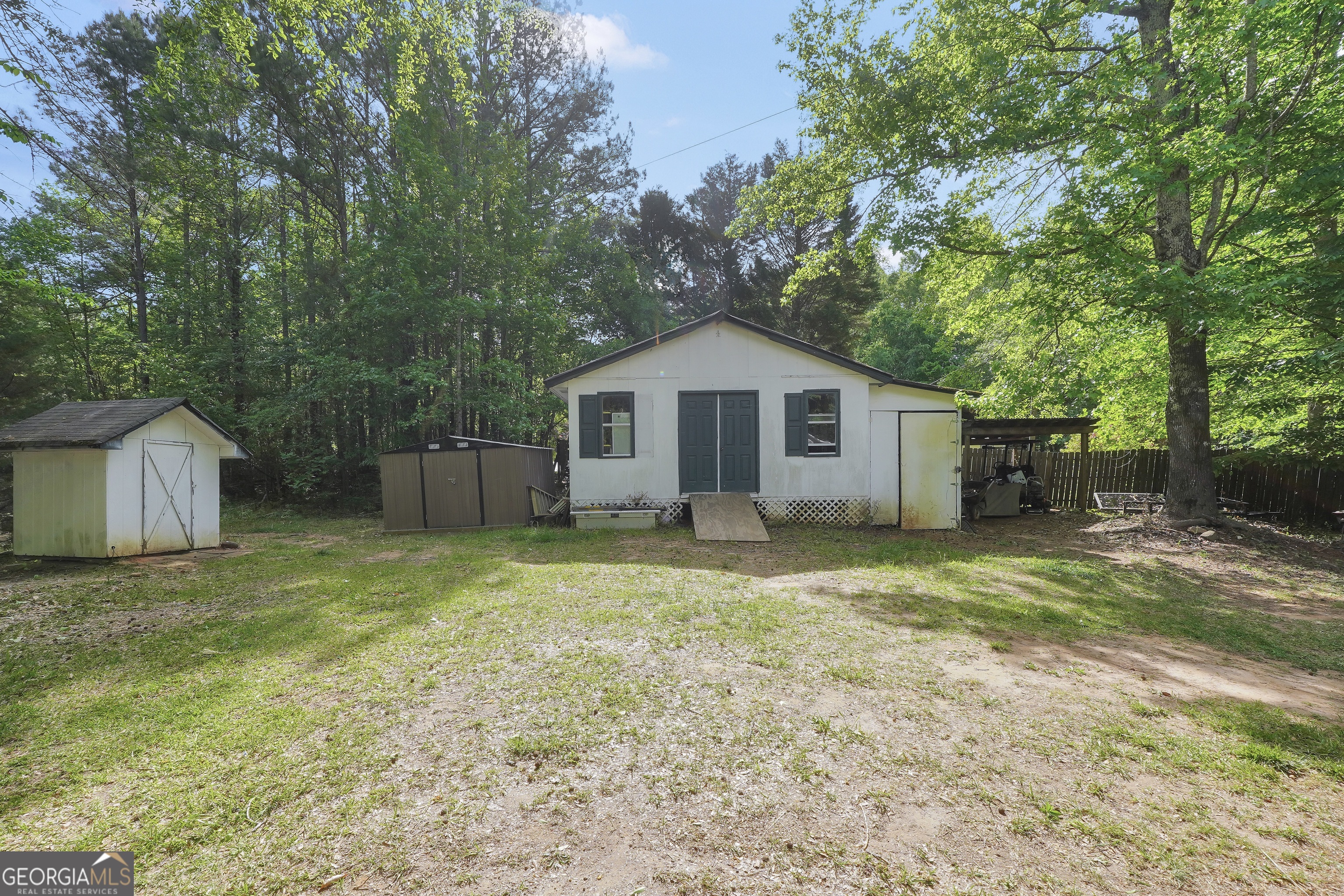 533 Chuli Road Griffin, GA 30223 - Photo 46 of 53 a front view of a house with a garden