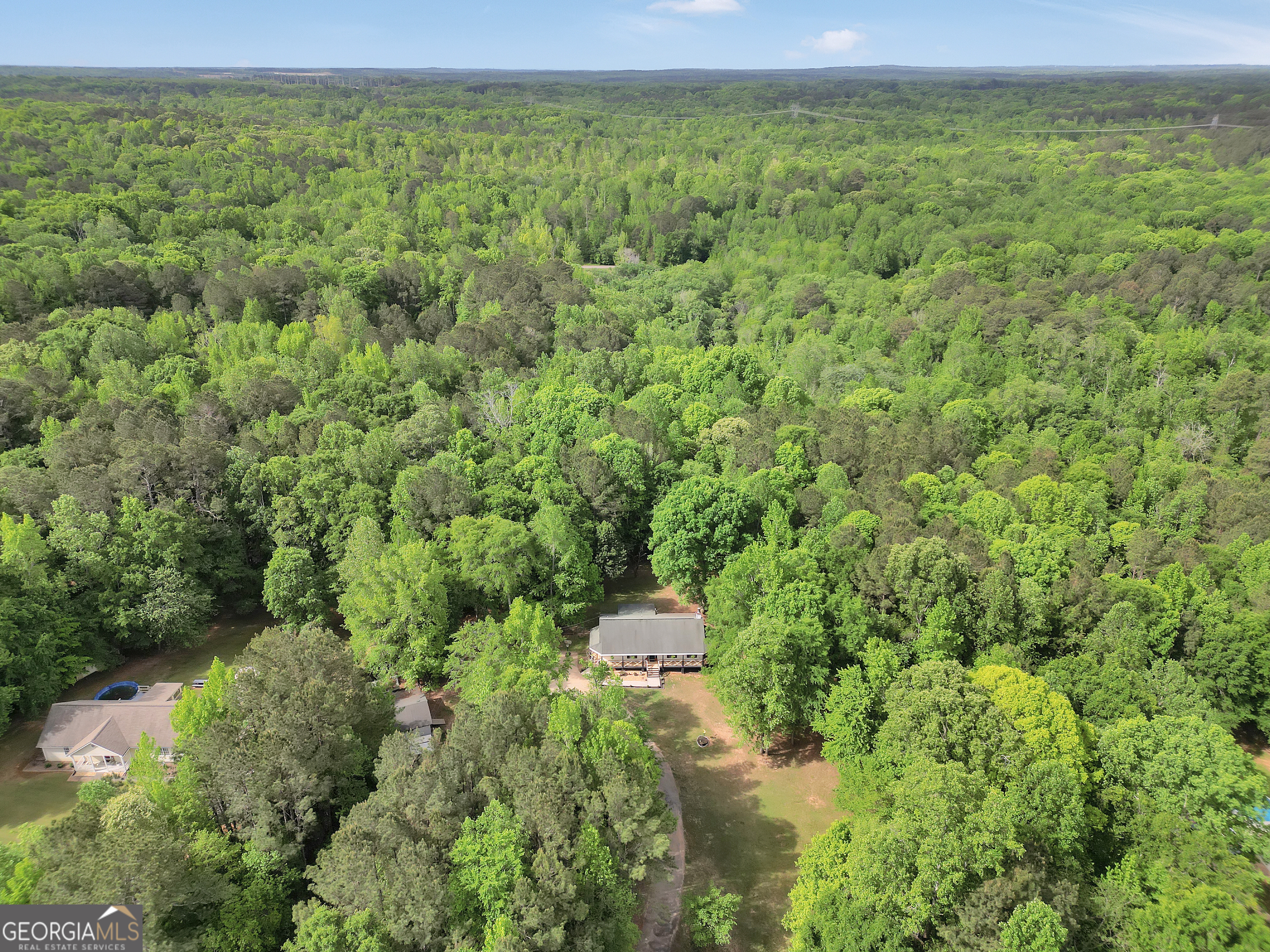 533 Chuli Road Griffin, GA 30223 - Photo 52 of 53 a view of a garden with a building