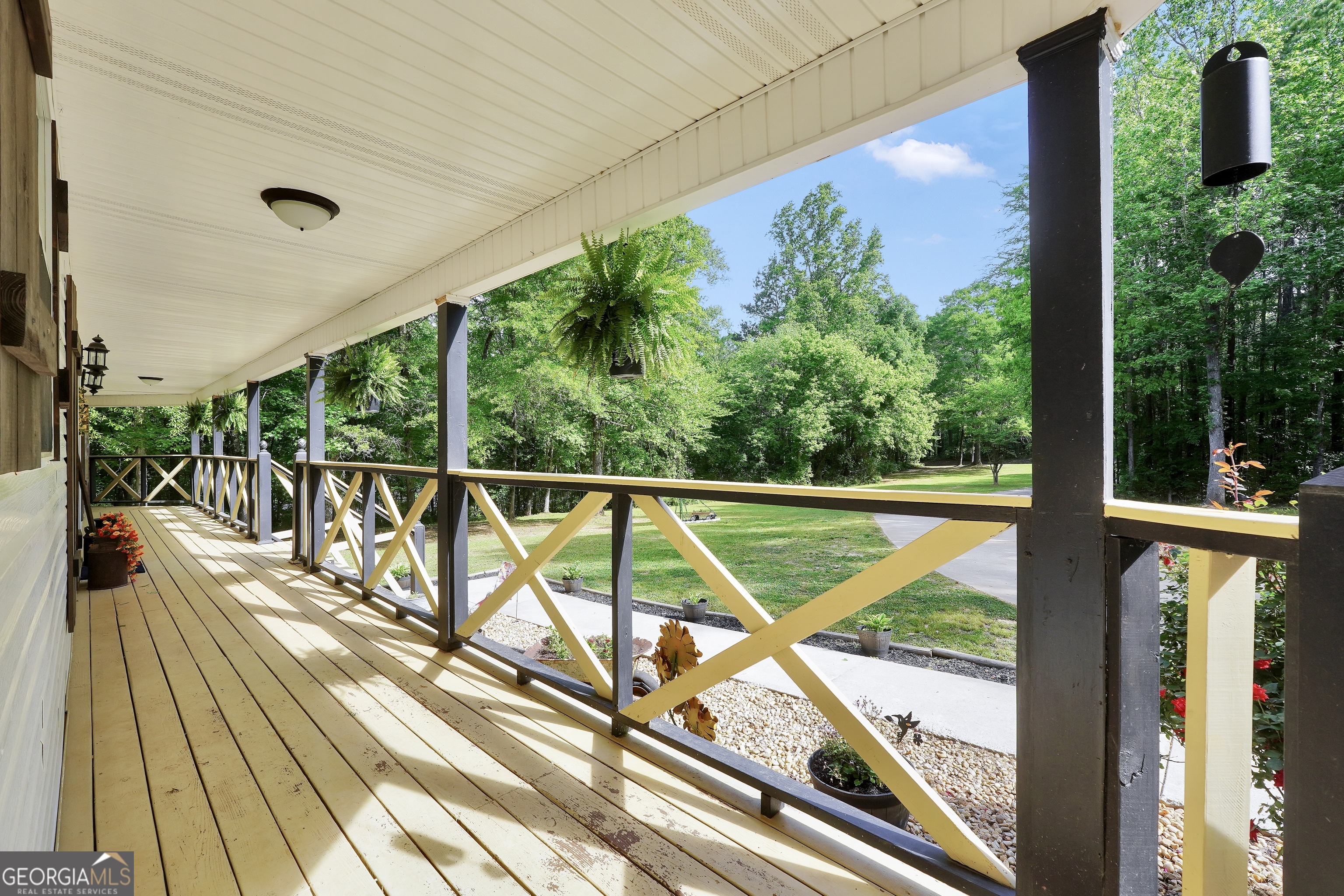 533 Chuli Road Griffin, GA 30223 - Photo 7 of 53 a view of a balcony with wooden floor