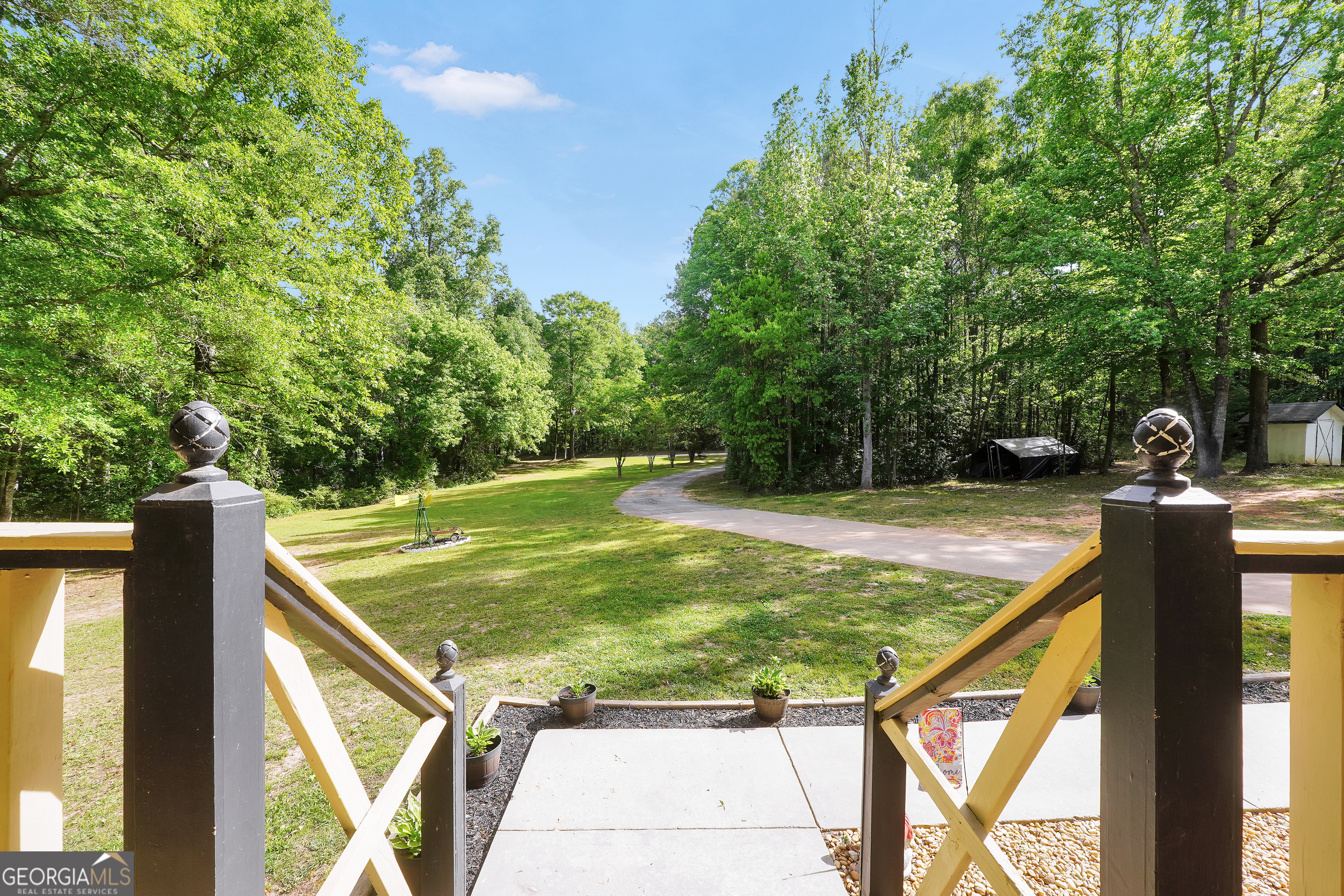 533 Chuli Road Griffin, GA 30223 - Photo 8 of 53 a view of a balcony with yard