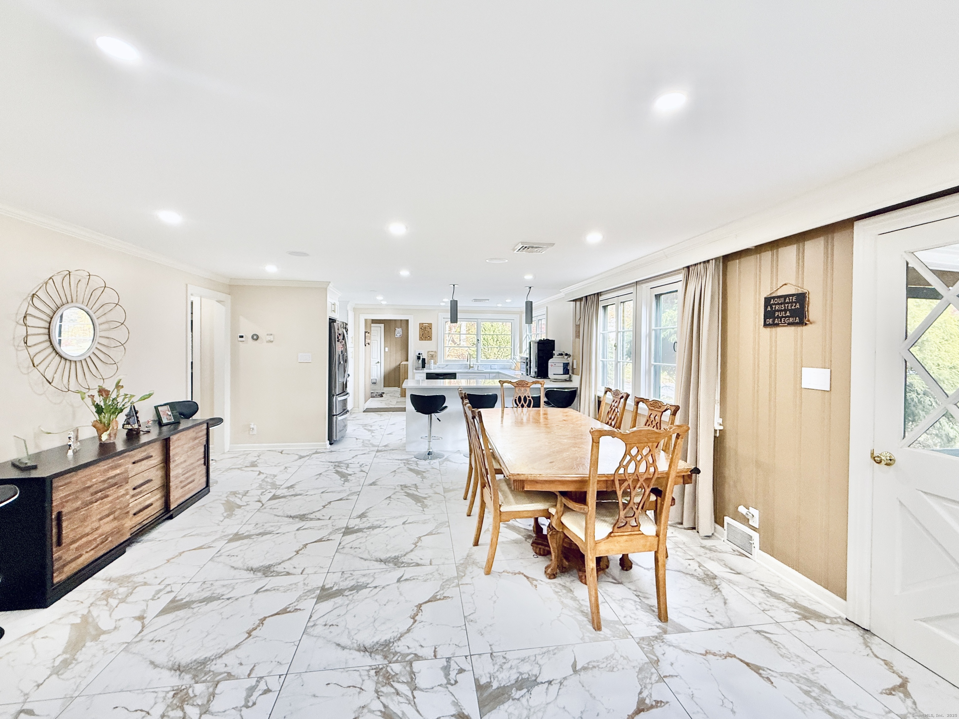 a view of a dining room with furniture