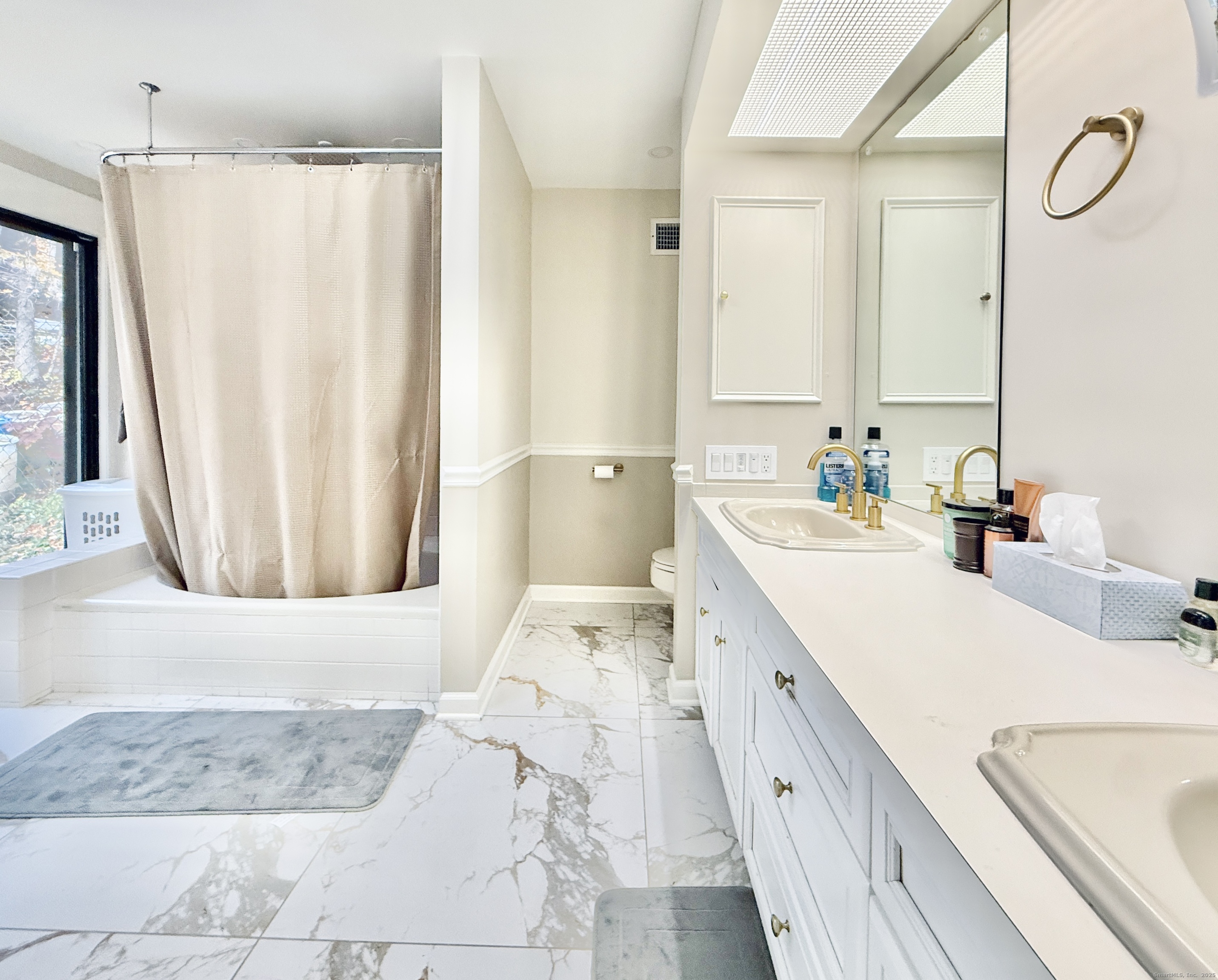 148 Bungay Road Seymour, CT 06483 - Photo 11 of 20 a bathroom with a double vanity sink and a mirror