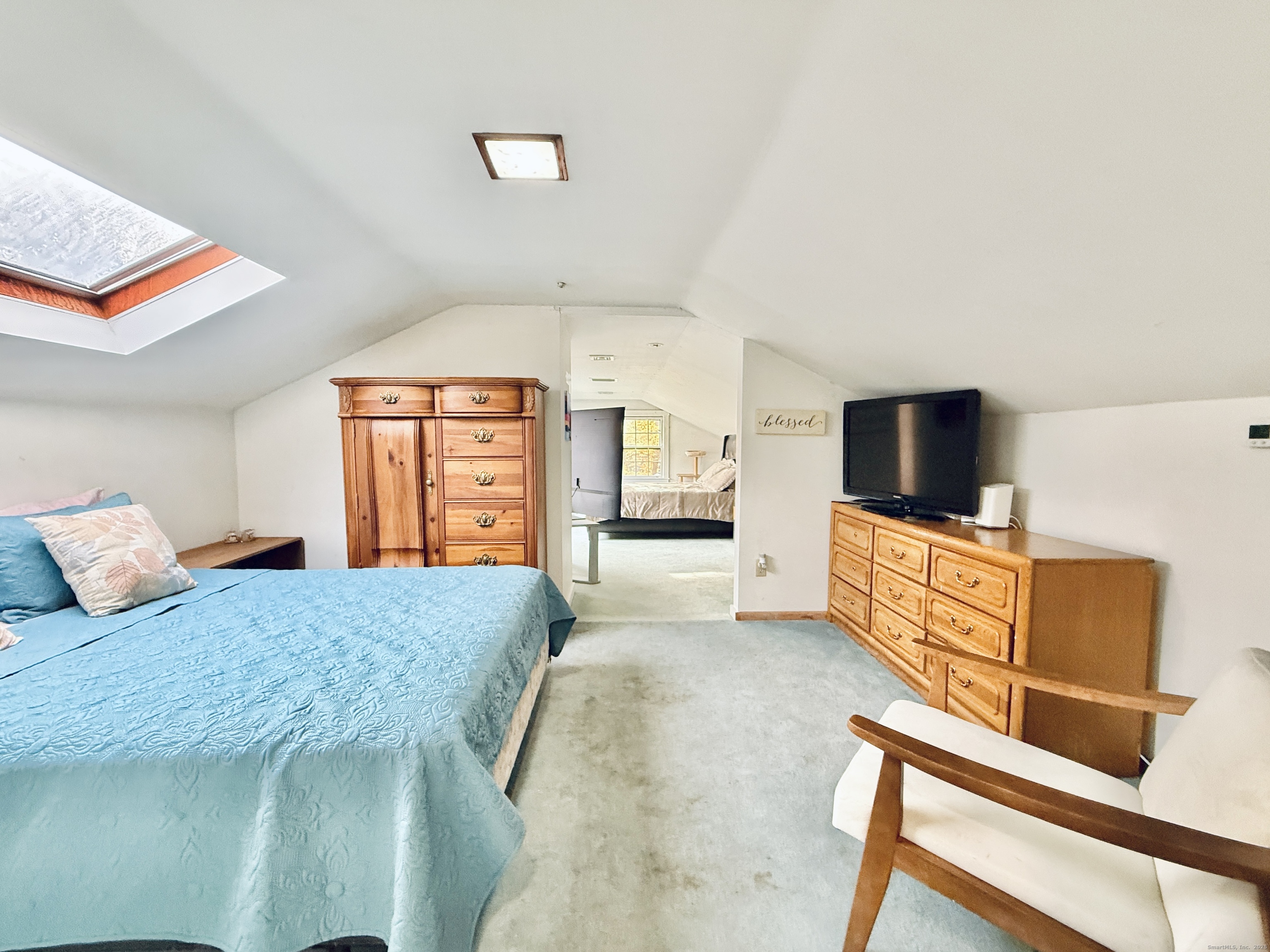 148 Bungay Road Seymour, CT 06483 - Photo 12 of 20 a living room with furniture and a flat screen tv