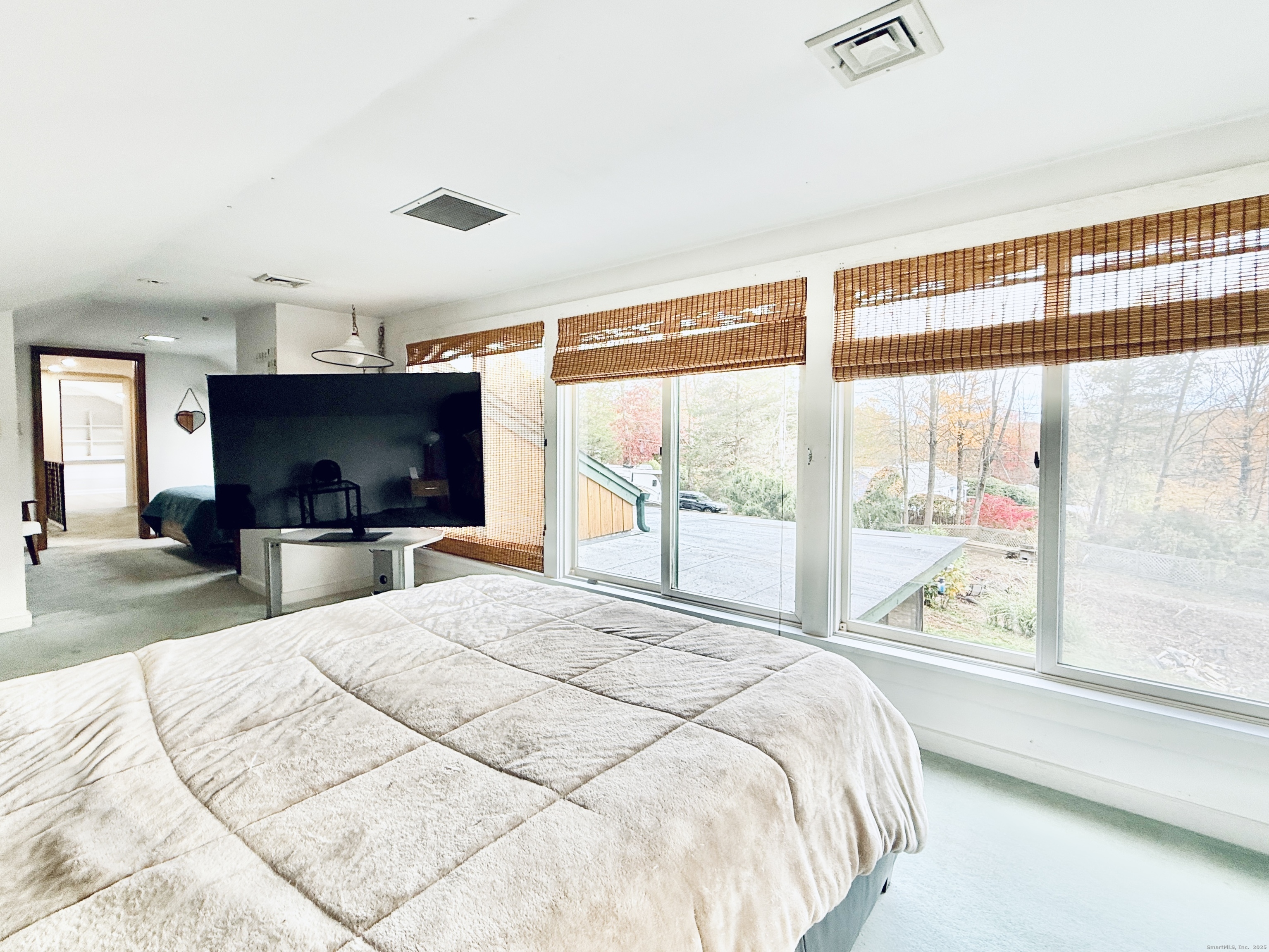 148 Bungay Road Seymour, CT 06483 - Photo 13 of 20 a large bedroom with a large bed and a large window